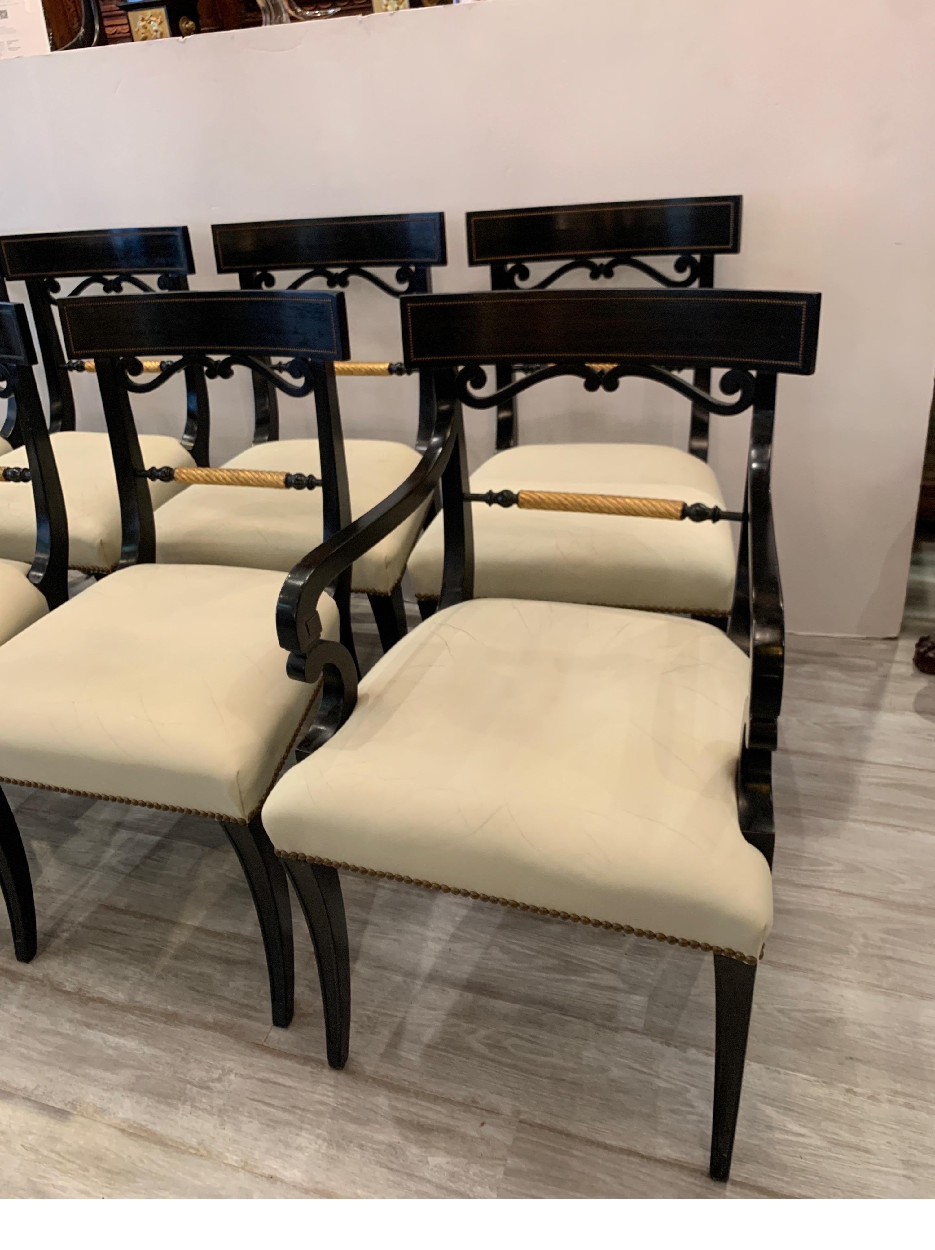 Neoclassical Midcentury Set of Eight Regency Style Ebonized and Gilt Dining Chairs