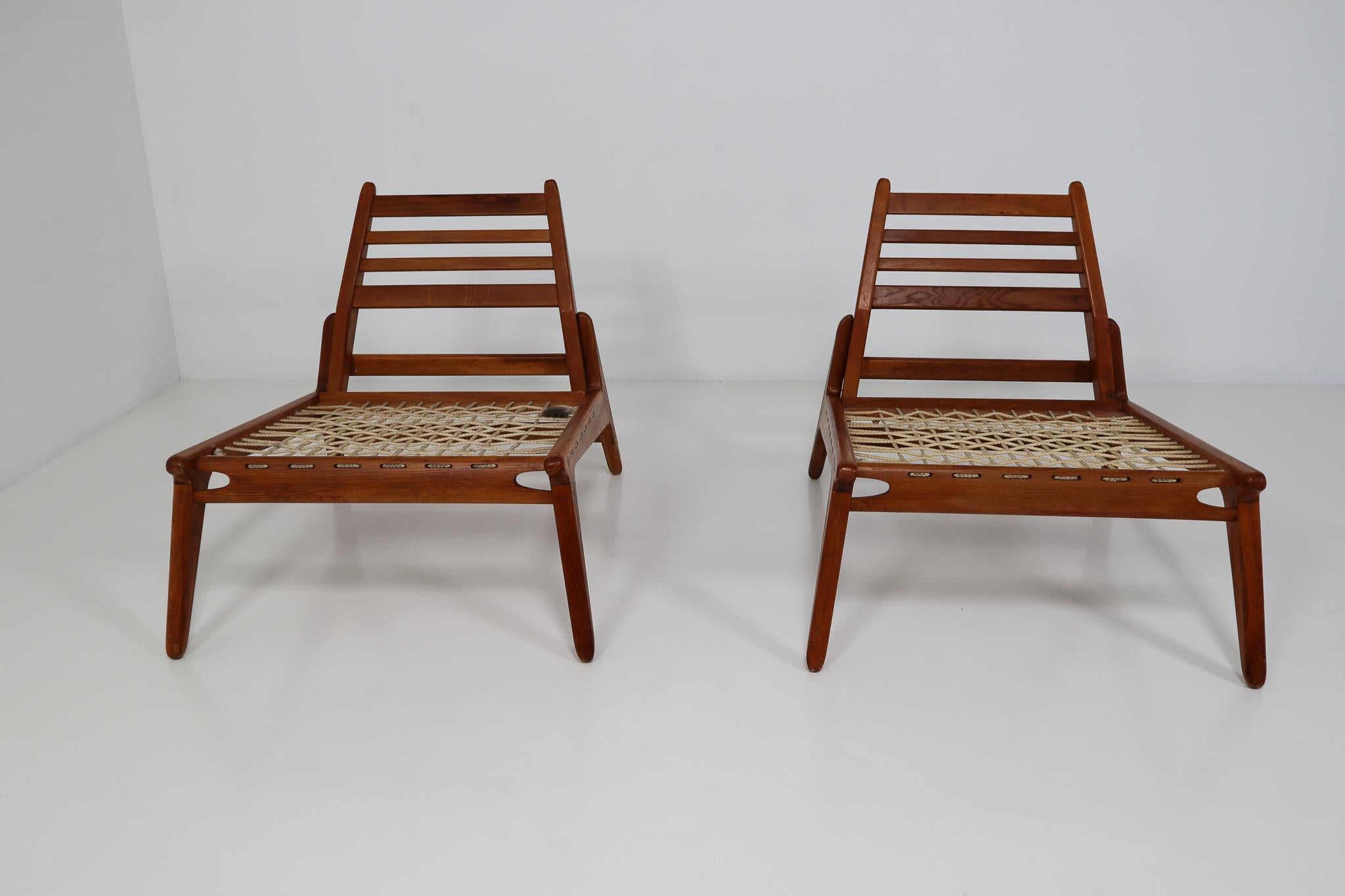 Mid-20th Century Midcentury Set of Two Easy Chairs and Two Ottomans in Oak
