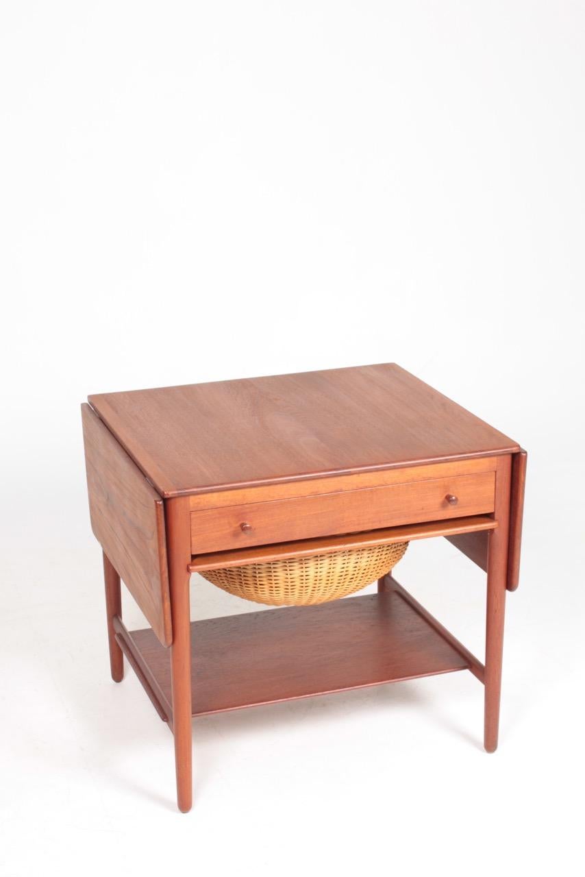 Sewing table in solid teak, designed by Hans Wegner and made by Andreas Tuck cabinetmakers. Great original condition.