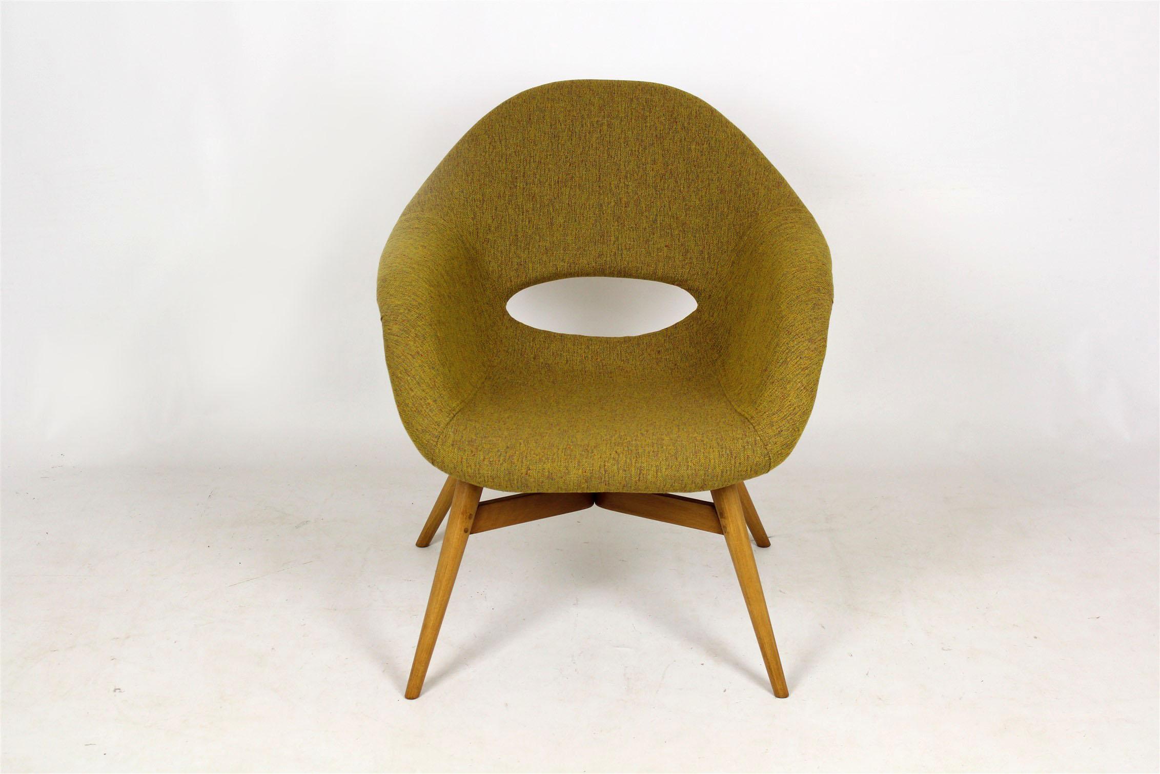 Shell chair designed by František Jirák in the 1960s. 
Completely restored with lacquered woodwork and new dirt/abrasion resistant fabric upholstery. 
Two pieces available.
 