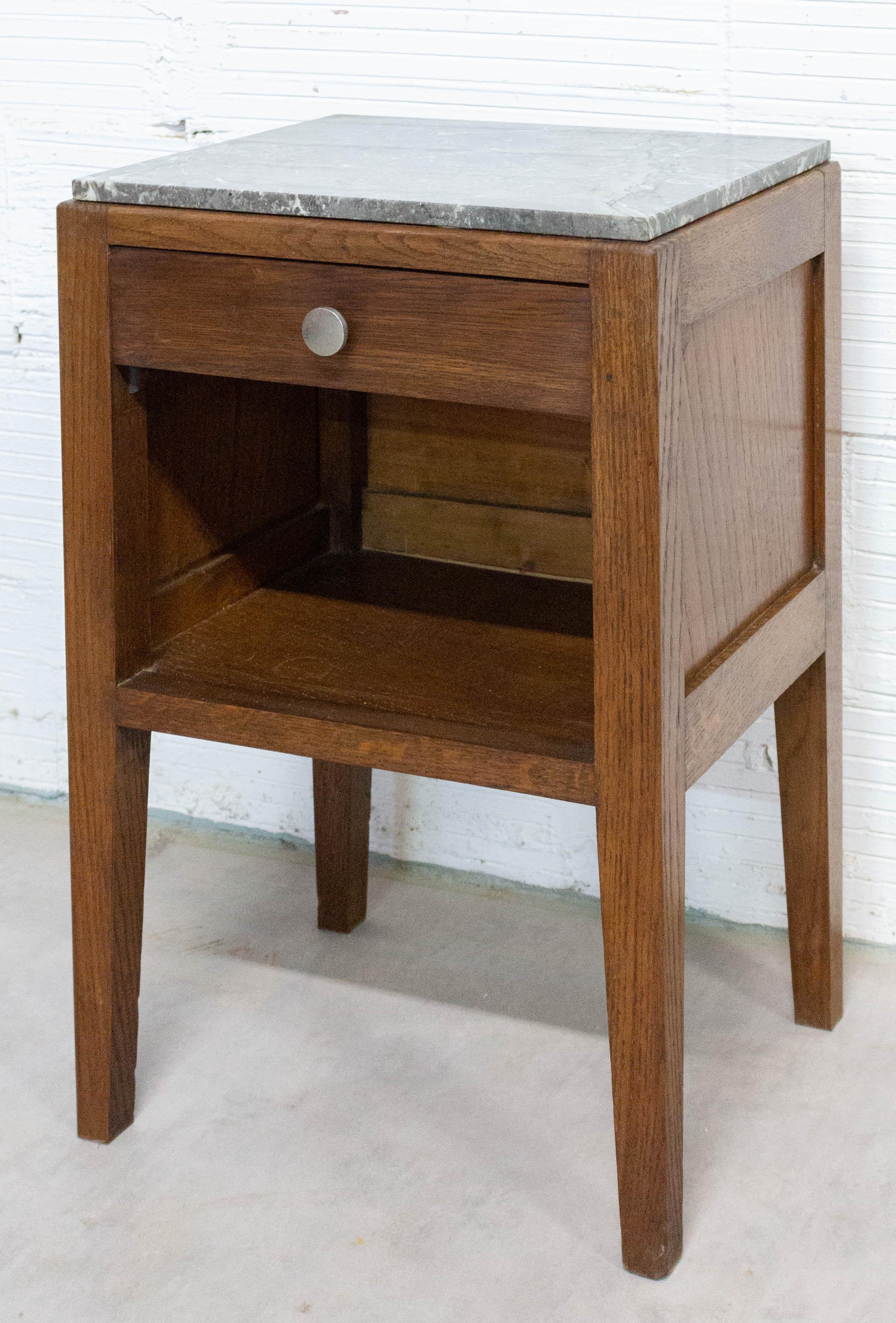 This French nightstand bedside table was made circa 1950. 
This side cabinet has a grey marble top.
Good and authentic condition.

Shipping: L 44, P 34, H 65.5 13.4kg.