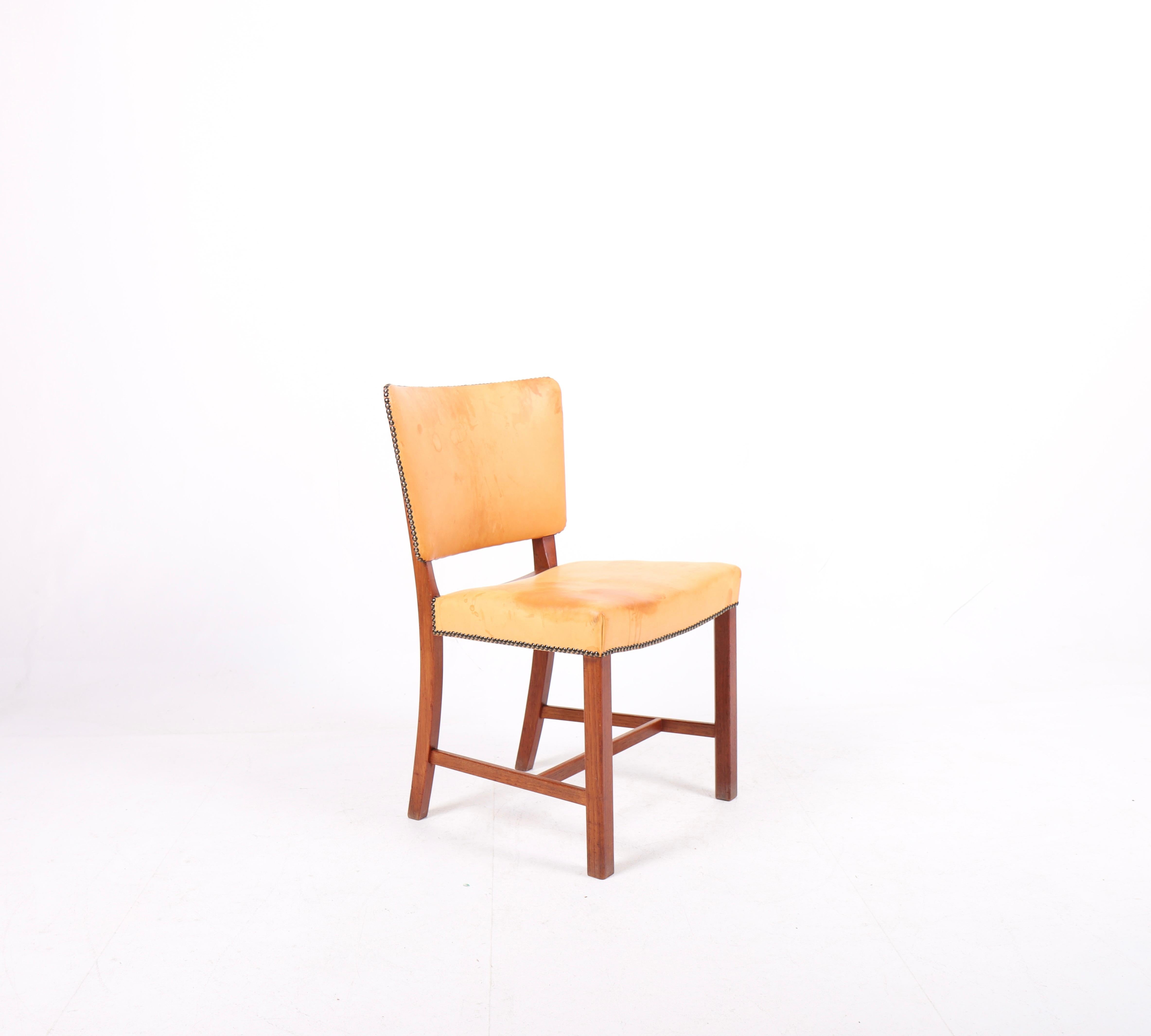 Side chair in teak and patinated leather, designed by Stig Thoresen Lassen and made by Henrik Wørts cabinetmakers. Great condition.