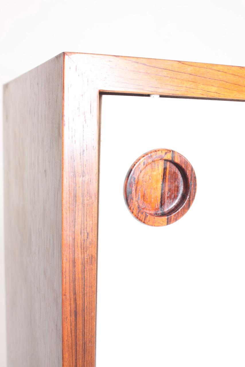 Sideboard in rosewood with white panels - Designed and made by Poul Hundevad Furniture Denmark in the 1960s.