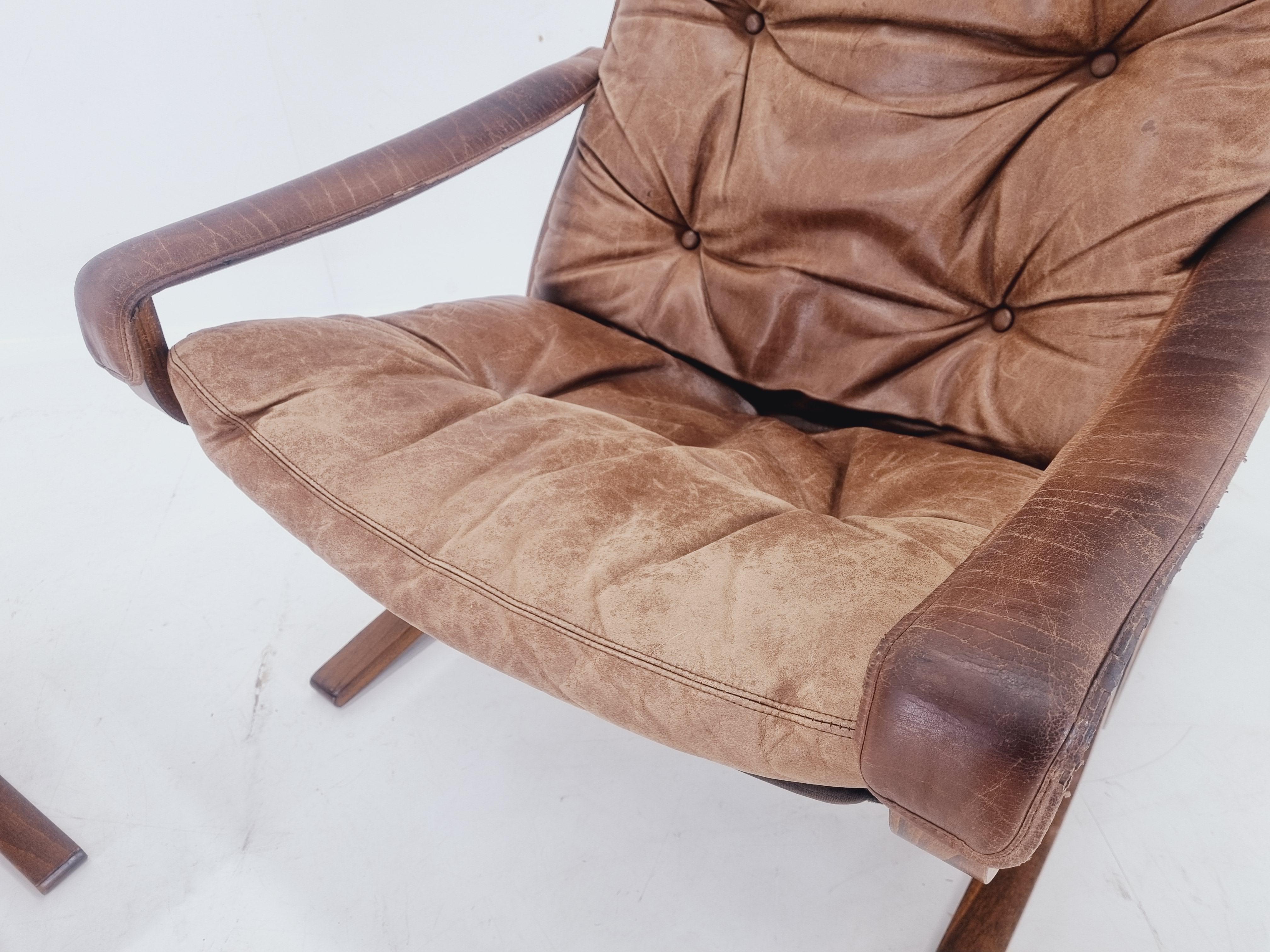 Leather Midcentury Siesta Lounge Armchair and Footstool, Ingmar Relling, Westnofa, 1960s