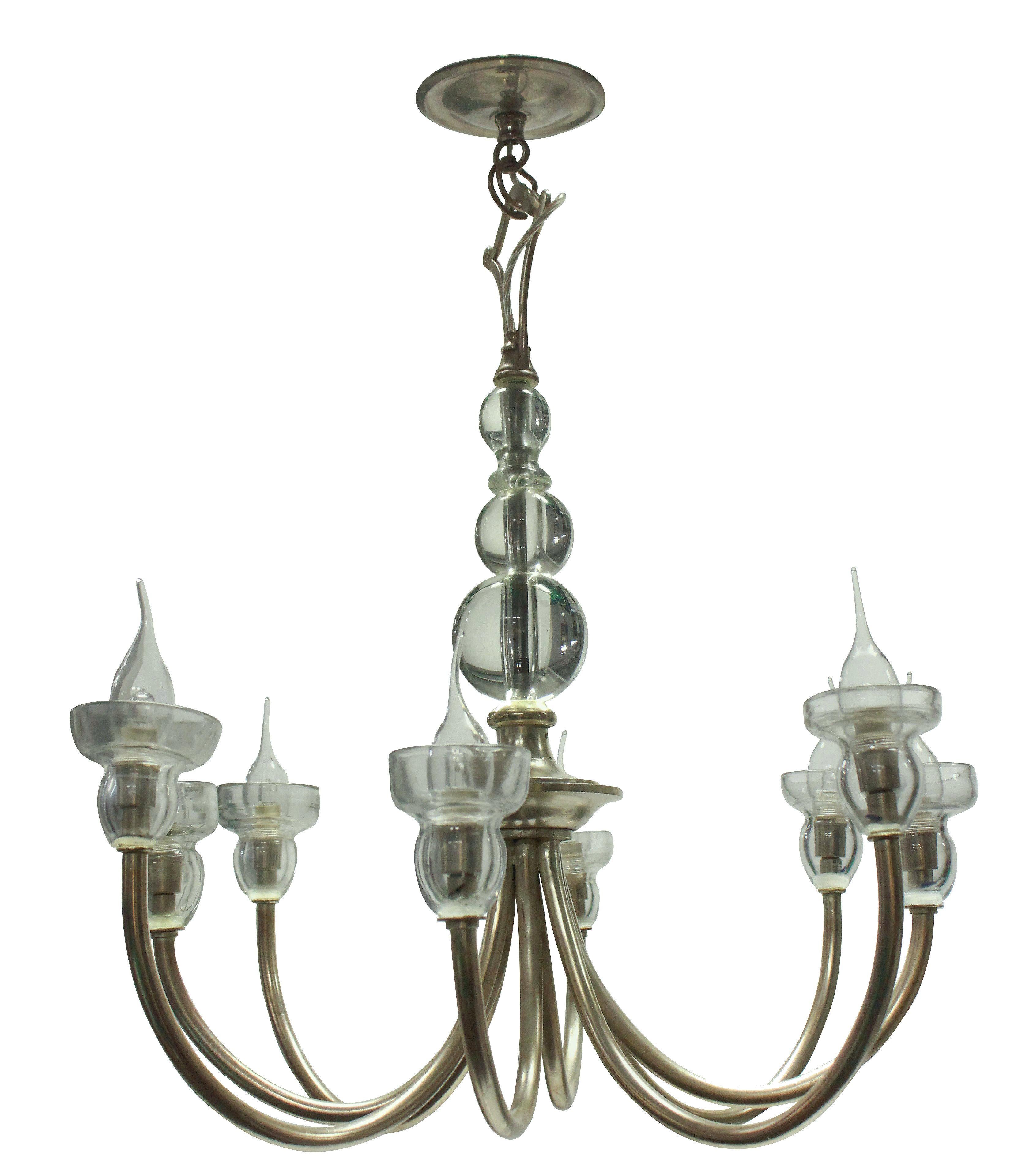 A French mid-century chandelier of interesting design in silvered metal with good quality glass detailing, with a spherical centre stem and drip sconces.