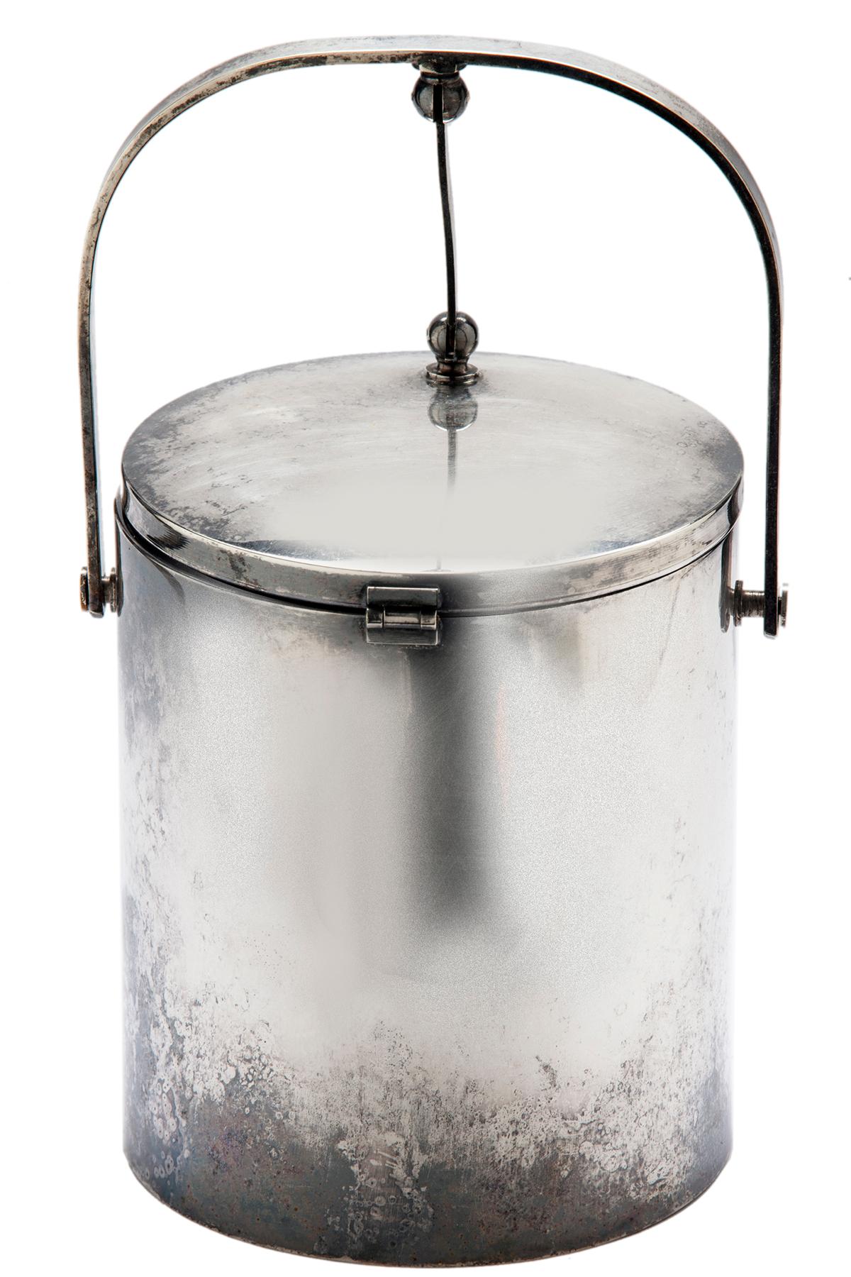 Sleek midcentury modern silverplated cylindrical ice bucket with attached lid & insert. A shiny mirror like finish is possible, the images above show the ice bucket   polished, we left some of the natural mottling with the polished finish for