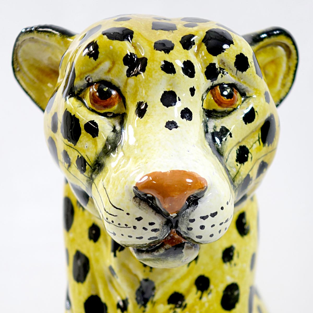 This is a very elegantly shaped sitting cheetah that was molded and not cast as most of the animal figurines from the midcentury period. Hand painted. With its height of 62cm (24.4 inches) it is both perfect on the ground as in a bay window. Marked