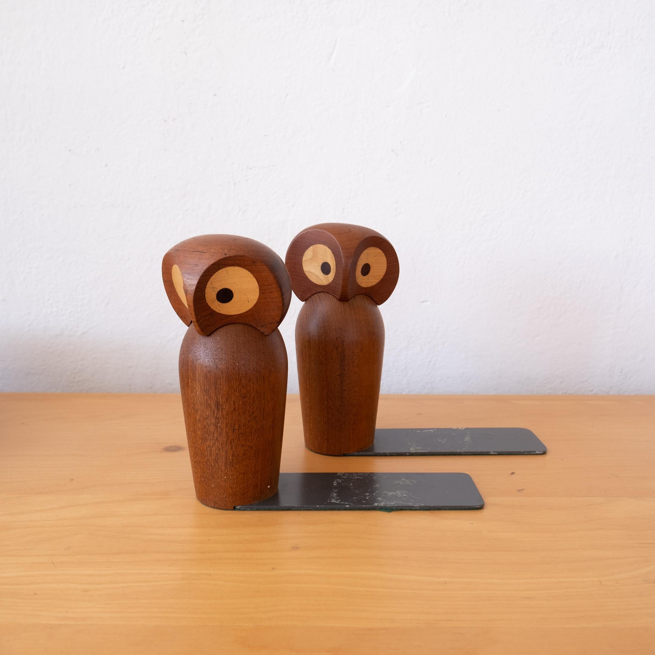 Rare pair of teak owl bookends made by Skjode Skjern. Finely crafted with mixed wood. Posable heads. Denmark, 1950s