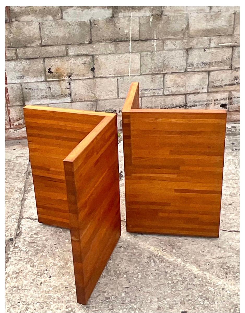 Fantastic vintage Butcher Block Slab dining table pedestals. a clean and chic L shaped pair that dative any room a boho look. Perfect as a dining table or even used for a desk. Acquired from a Palm Beach estate.