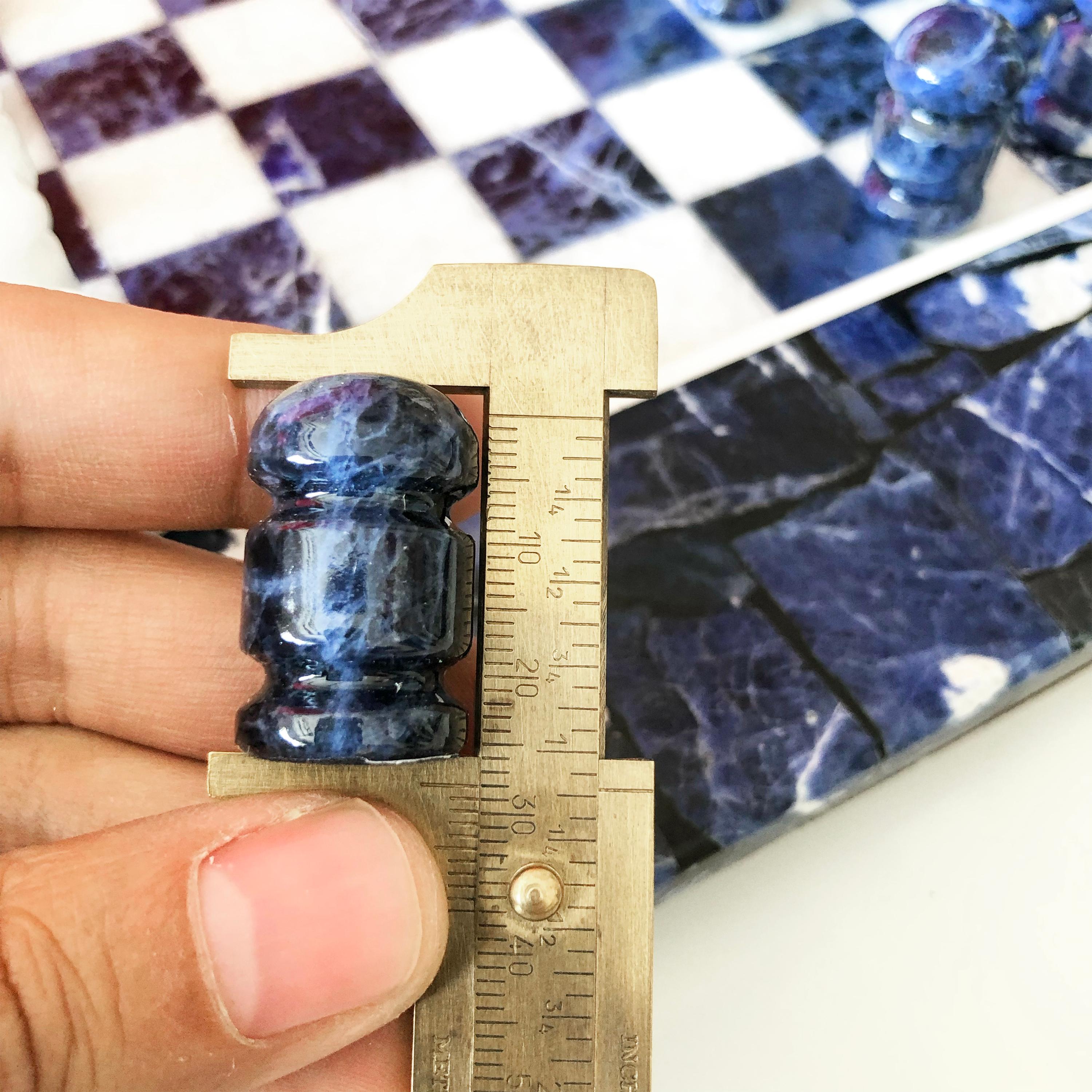 blue and white marble chess set