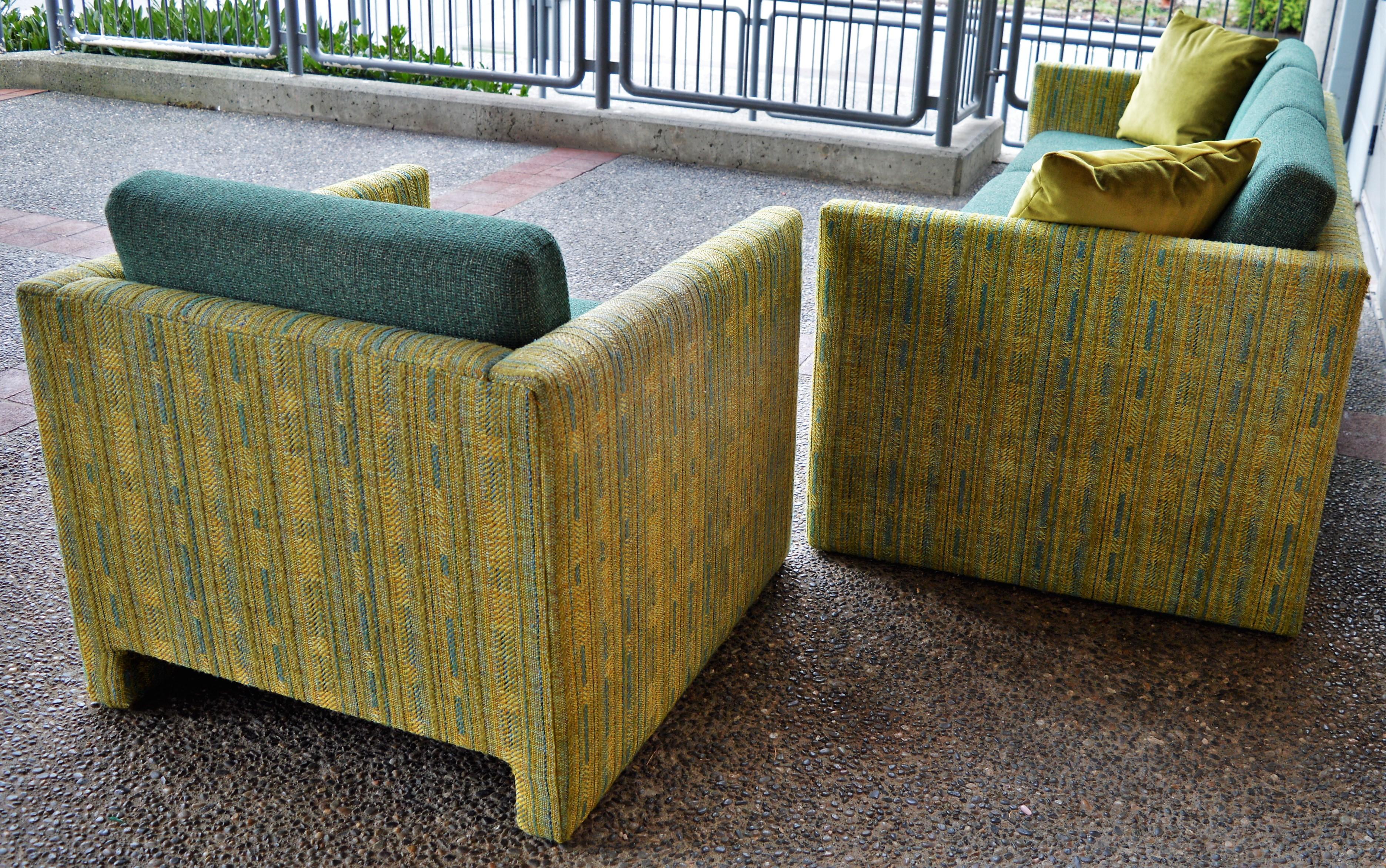Amazing Mid-Century Modern green/teal high quality sofa and club chair in outstanding original condition. Featuring seat cushions with all new foam in a gorgeous teal wool, contrasting with the green/teal patterned cubic surround. Superbly