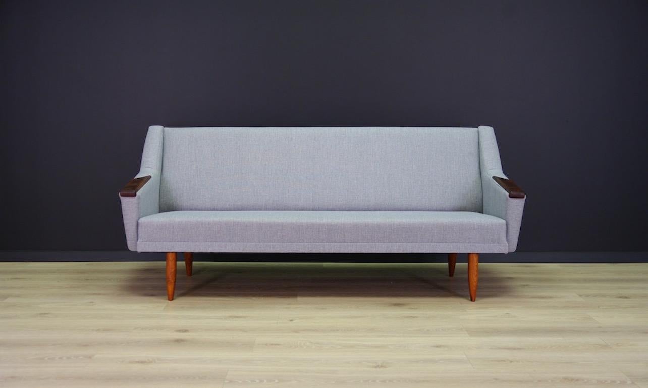 Midcentury sofa from 1960s-1970s, beautiful minimalist form - Scandinavian design. The sofa is covered with new upholstery. Phenomenal teak armrests. Preserved in good condition (minor scratches on the armrests) - directly for use.

Dimensions: