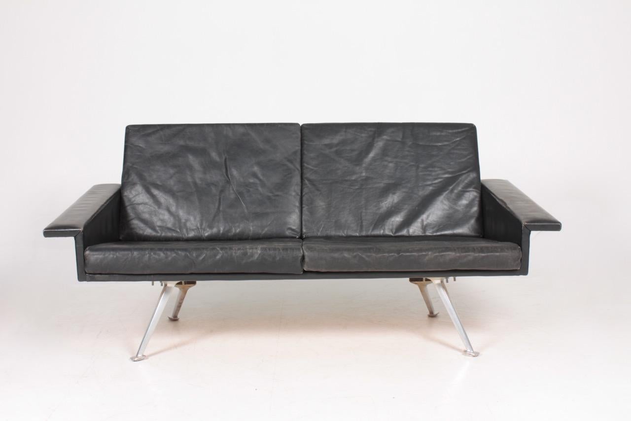 Great looking and comfortable sofa in patinated leather. Designed and made in Denmark, 1960s. Original condition.