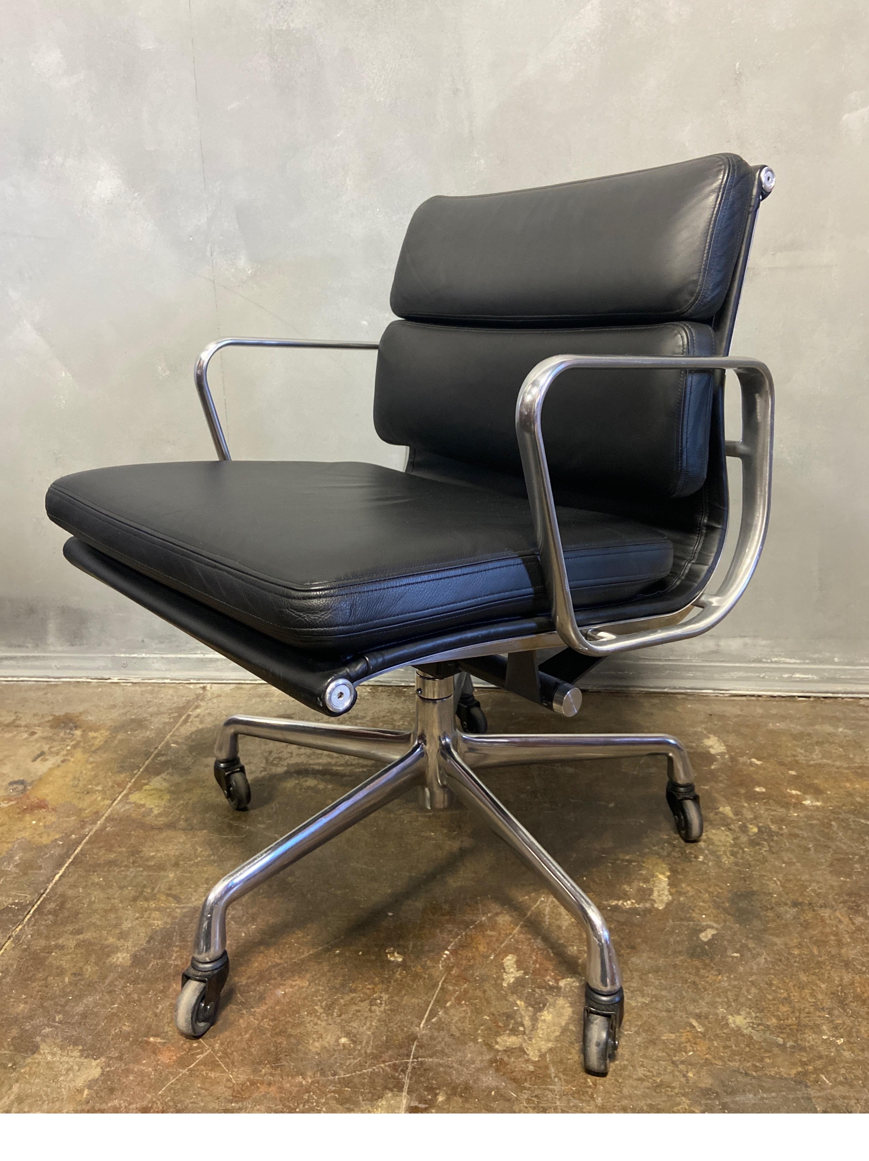 For your consideration is this authentic Eames for Herman Miller vintage soft pad chair in black leather in exceptional good vintage condition. Adjustable tilt and height. These authentic vintage examples are icons of Mid-Century Modern design. The