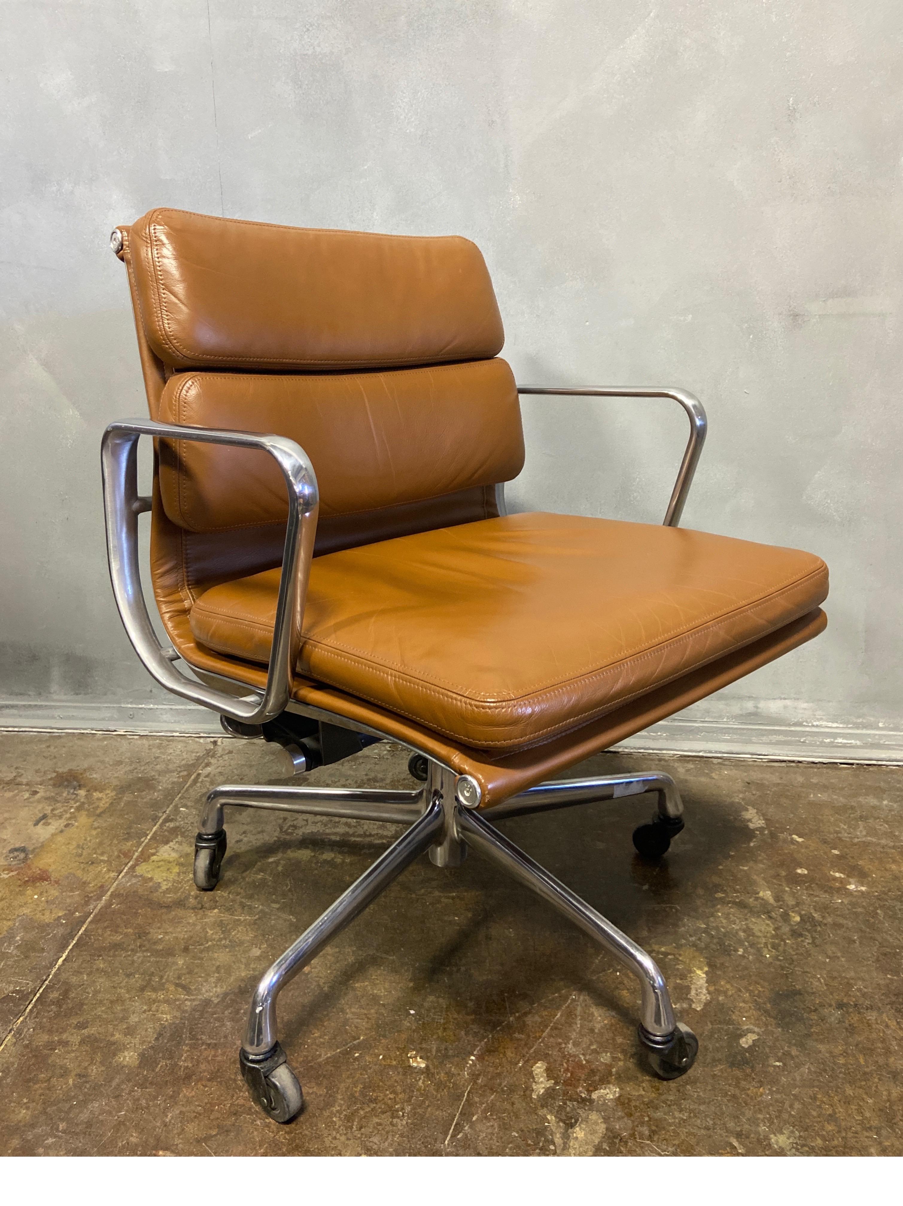 For your consideration is this authentic Eames for Herman Miller vintage soft pad chairs in Brown leather. Adjustable tilt and height adjustment. These authentic vintage examples are icons of Mid-Century Modern design. These chairs are part of the