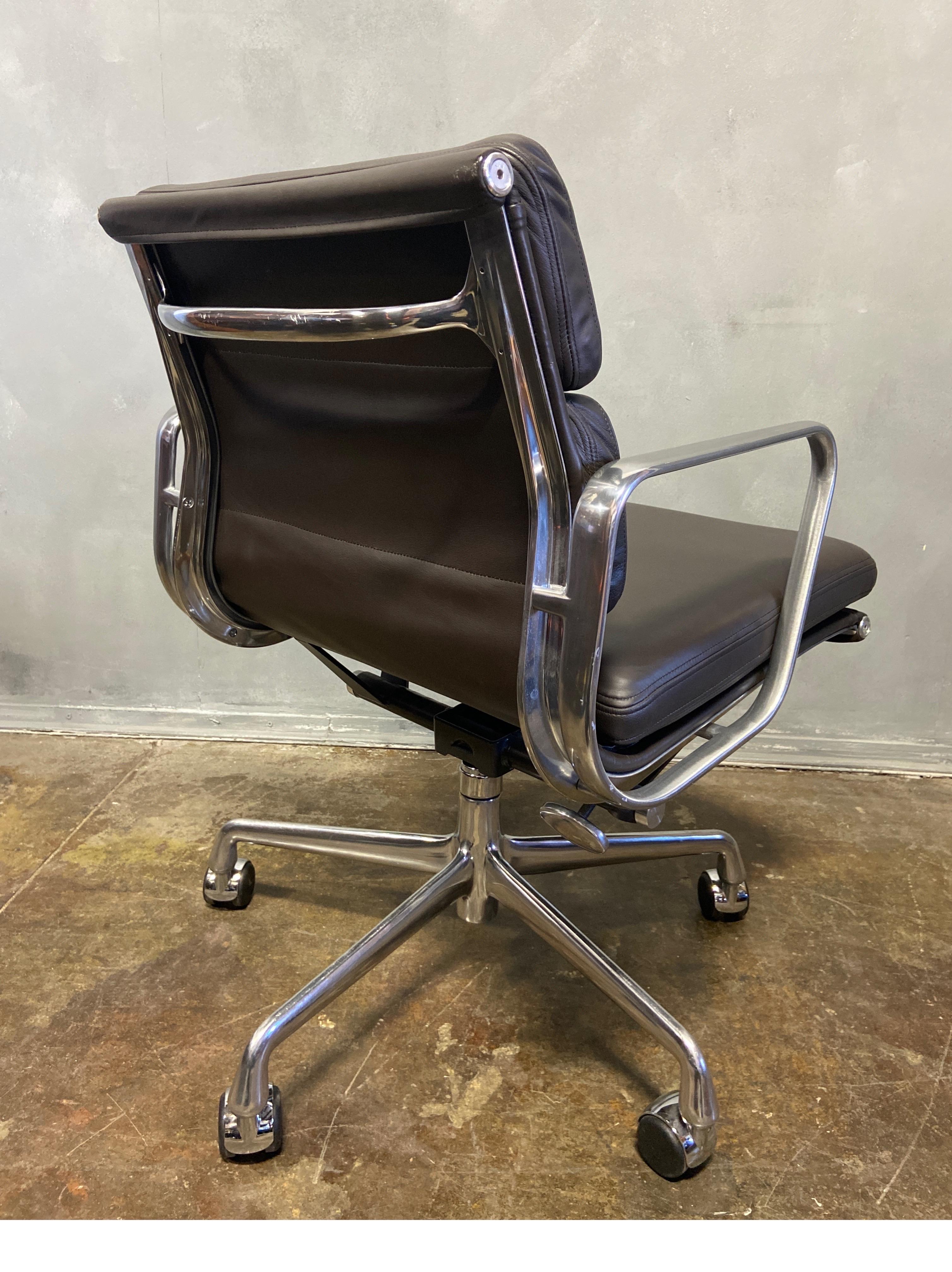 For your consideration is this authentic Eames for Herman Miller vintage soft pad chairs in Espresso Brown leather. Adjustable tilt and height. These authentic vintage examples are icons of Mid-Century Modern design. These chairs are part of the