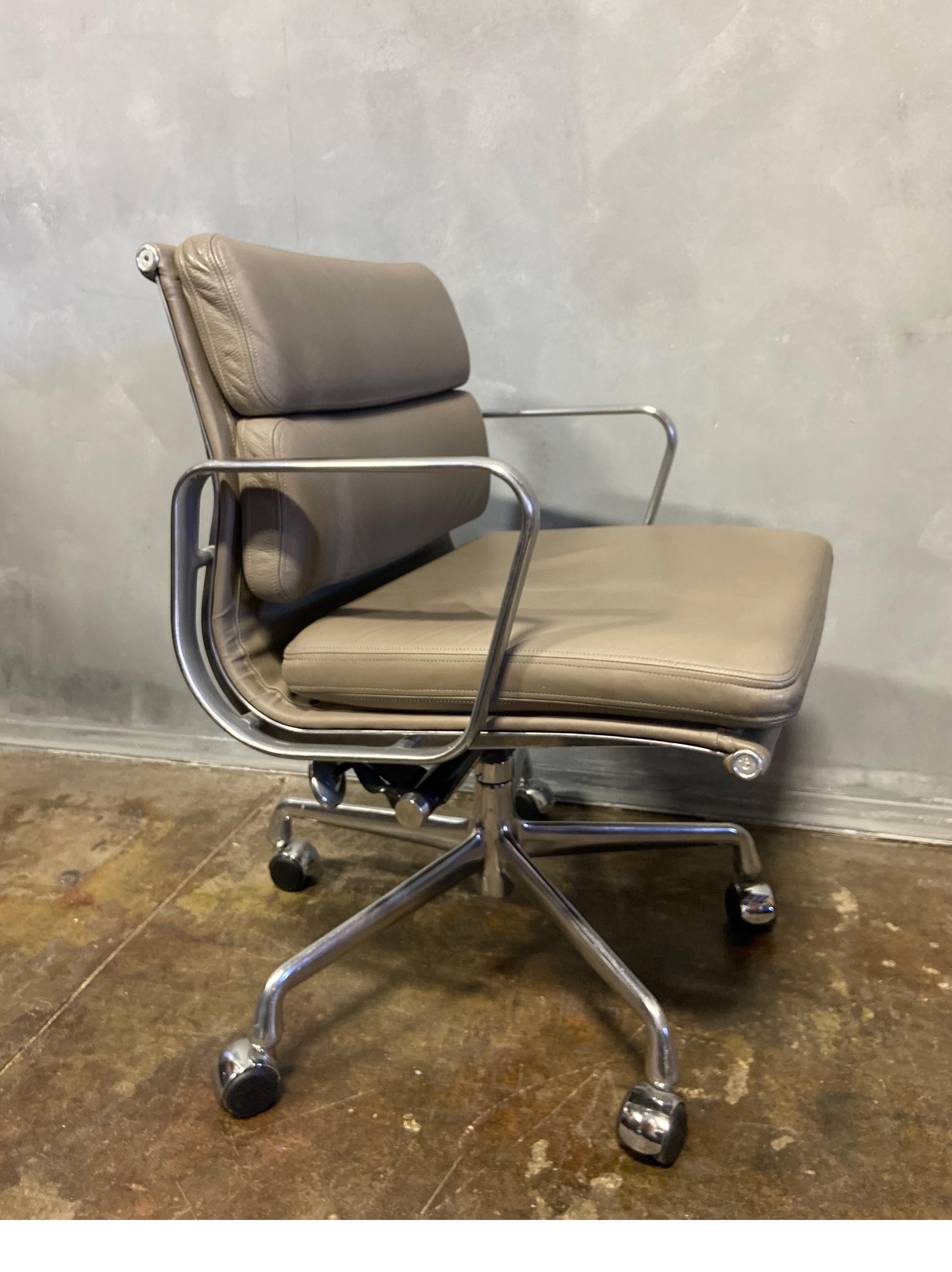 For your consideration is this authentic Eames for Herman Miller vintage soft pad chairs in Gunmetal Grey leather. Adjustable tilt and height on a 5 star base. These authentic vintage examples are icons of Mid-Century Modern design. These chairs are