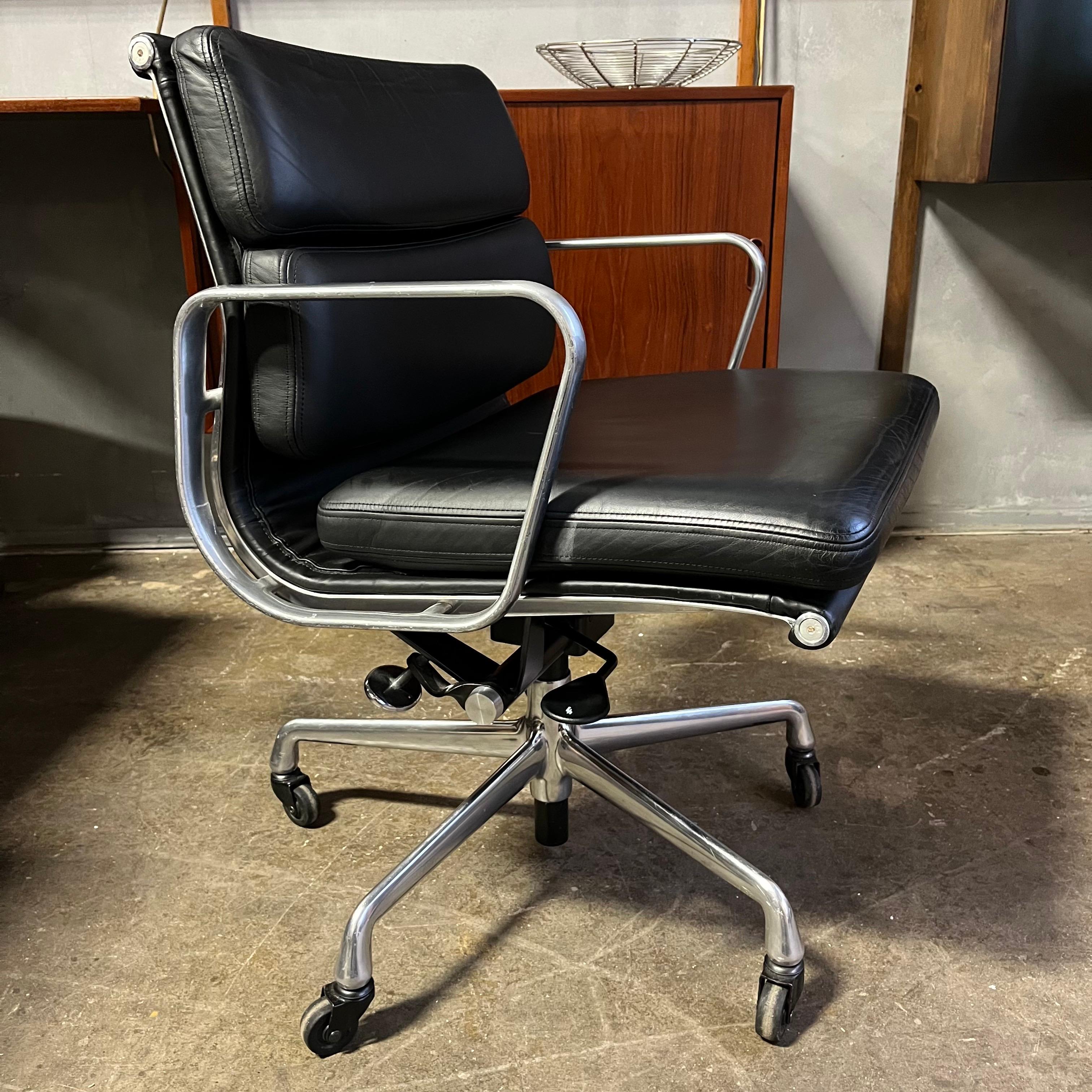For your consideration is this authentic Eames for Herman Miller vintage soft pad chairs in black leather. Adjustable tilt and height with pneumatic lift. These authentic vintage examples are icons of Mid-Century Modern design. The chairs part of
