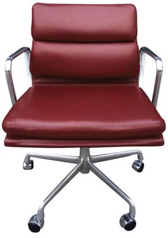 Chaises à accoudoirs du milieu du siècle dernier par Eames pour Herman Miller