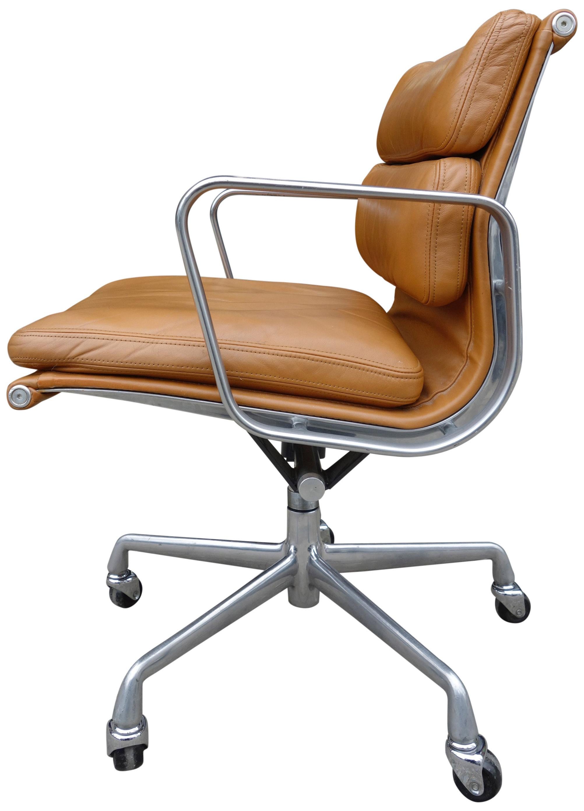 For your consideration is this authentic Eames for Herman Miller vintage soft pad chairs in brown leather. Adjustable tilt and height adjustment. These authentic vintage examples are icons of Mid-Century Modern design. These chairs are part of the