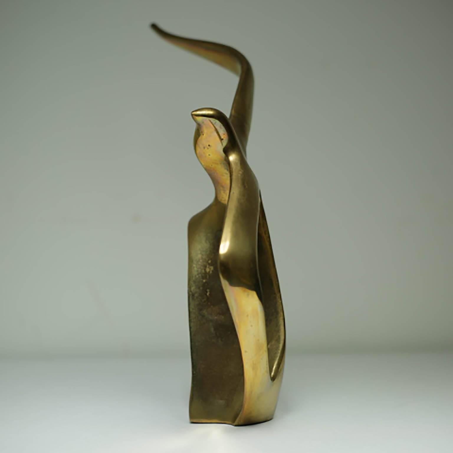 Solid brass sculpture of an albatross in flight, circa 1960s.