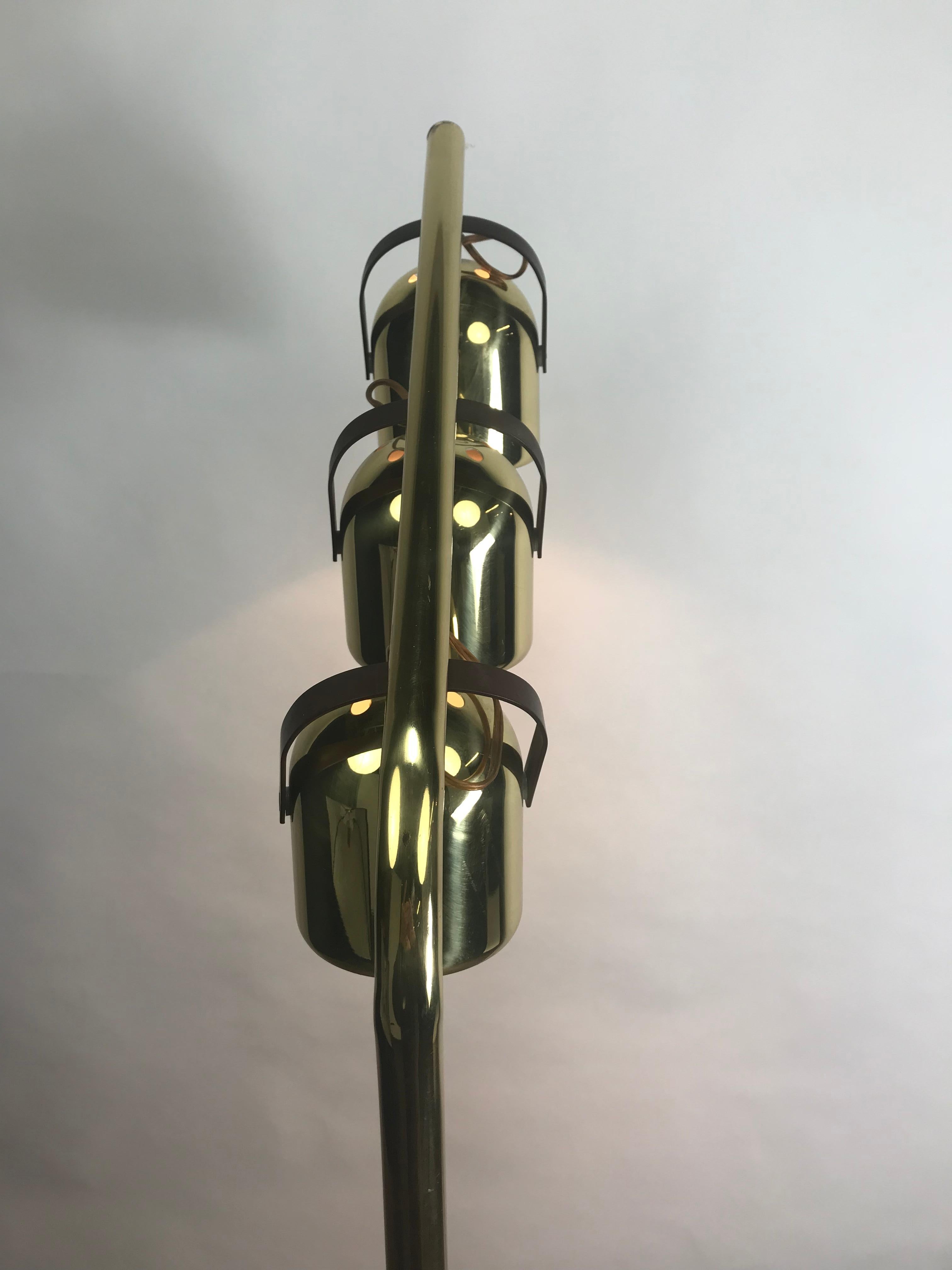 Stunning Space Age brass floor lamp with 3 adjustable spot lights by Clover Lamp Company, which produced modern lamps often modeled after Italian designs like those from Reggiani. They were located in Pennsylvania & Clover name is on underside of