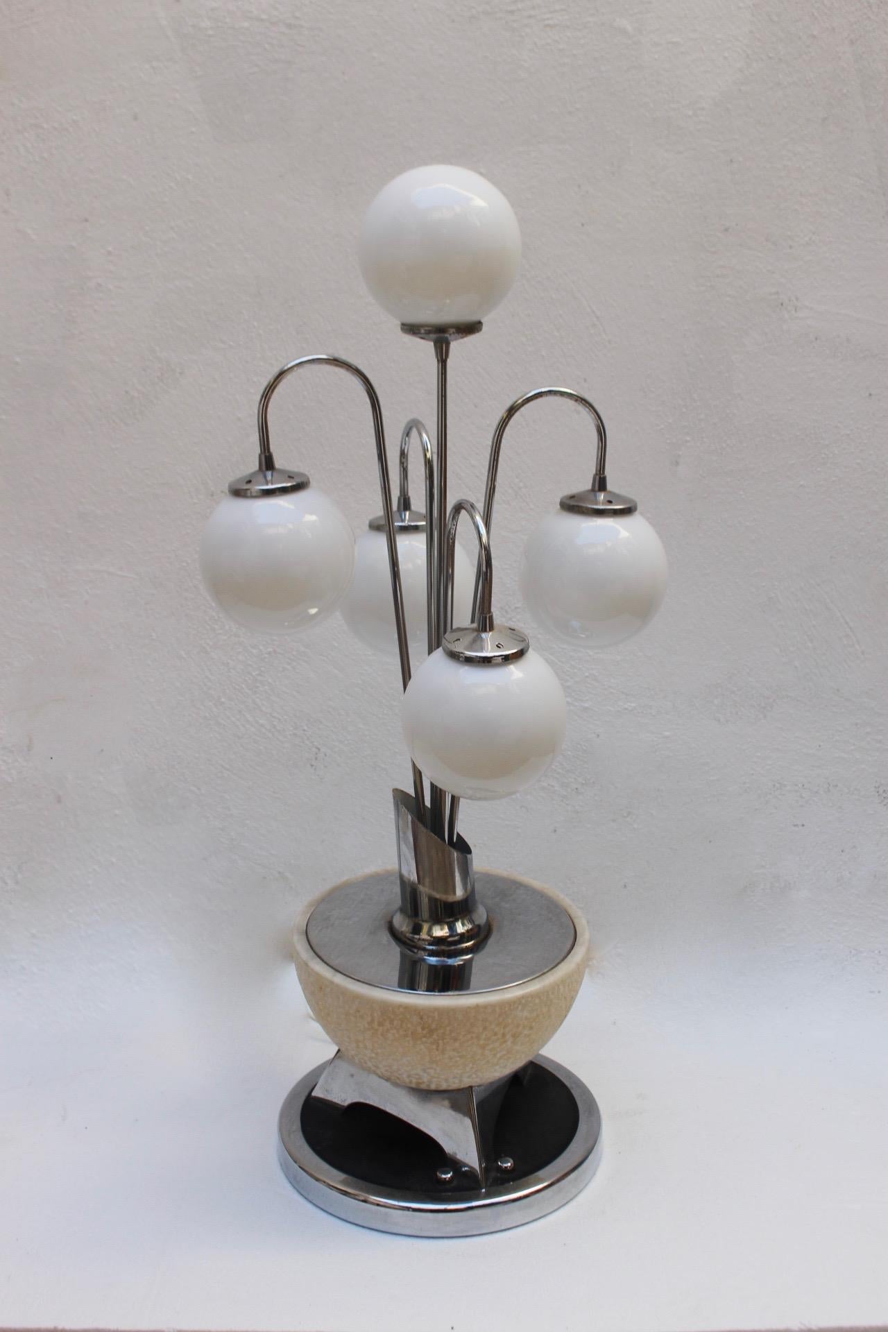 Rare to see, midcentury Space Age cascade or Fontana Alabaster table lamp with 5 hanging lights and 1 more light inside the alabaster base. They can be used by separate or at the same time.