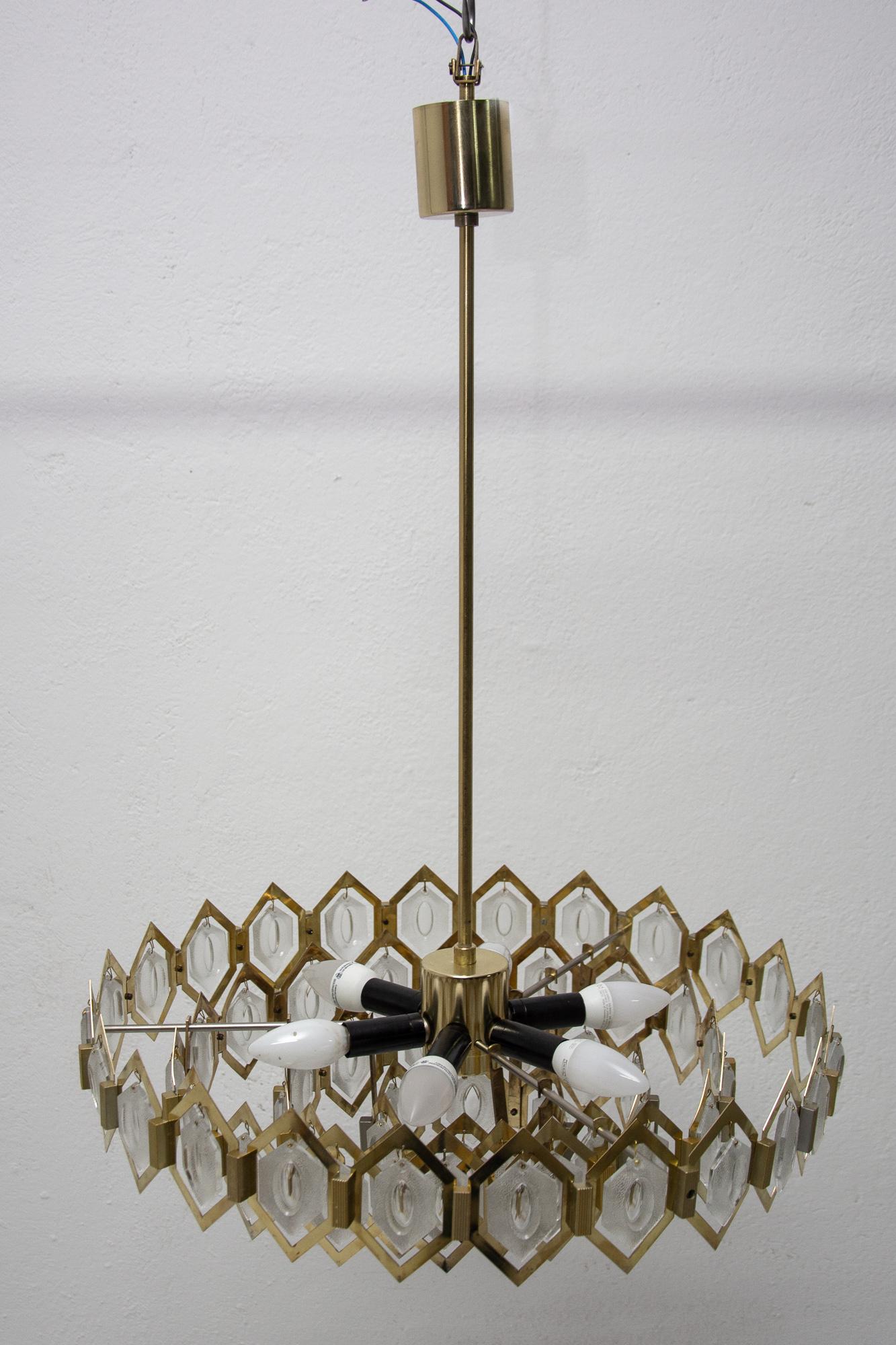 This Cascade pendant was designed by Czech designer Jaroslav Bejvl in the 1970s and it was produced by Kamenický Šenov. It is made of a combination of glass and metal. It was completely professionally cleaned and rewired.

