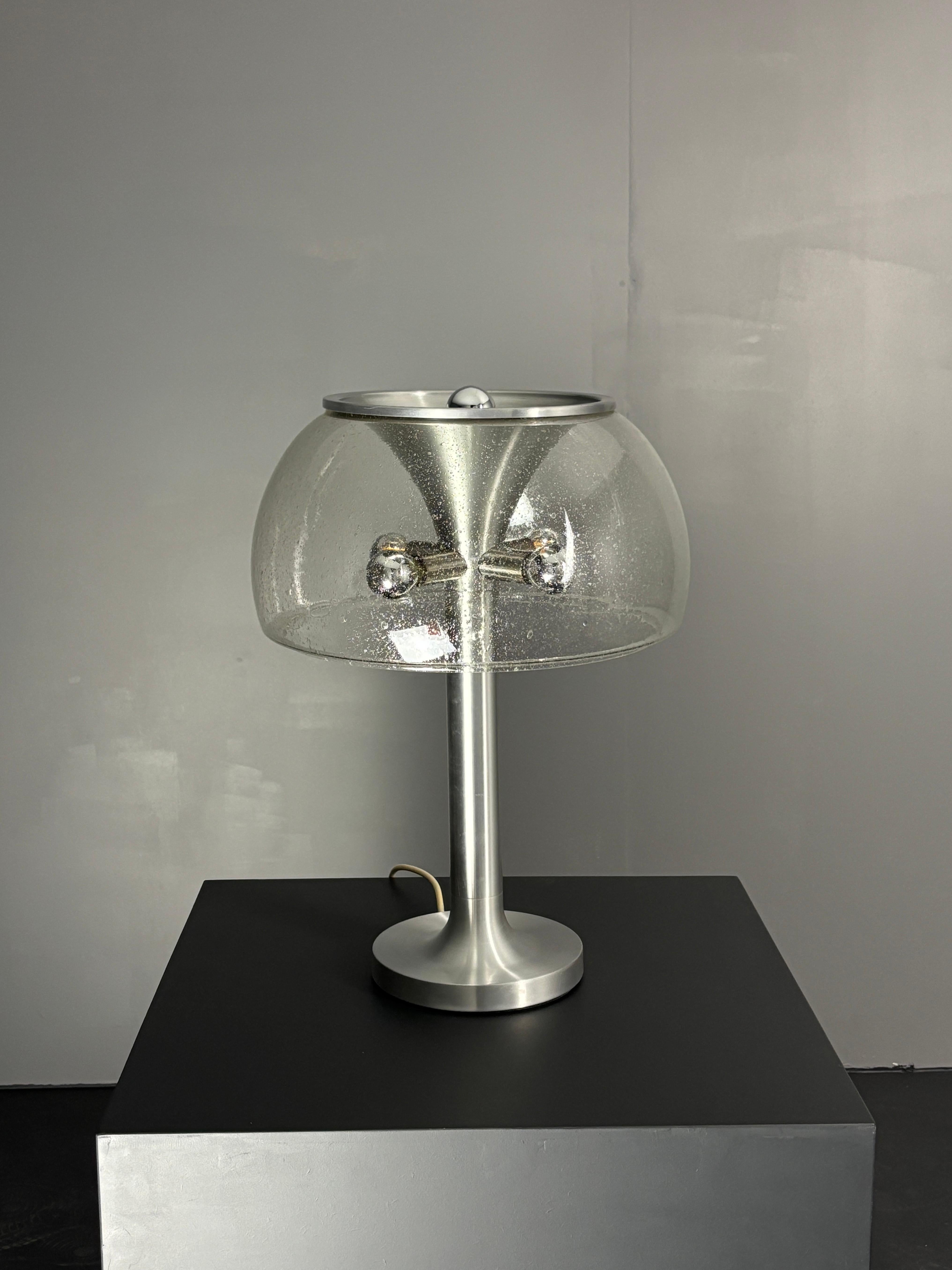 Rare and large ( 55 cm high, diameter 40 cm ) space age table lamp by Temde, Switzerland 1960s. This metal and handblown mineral glass mushroom shade table lamp is in great condition with no real flaws to mention and only some very light wear due to