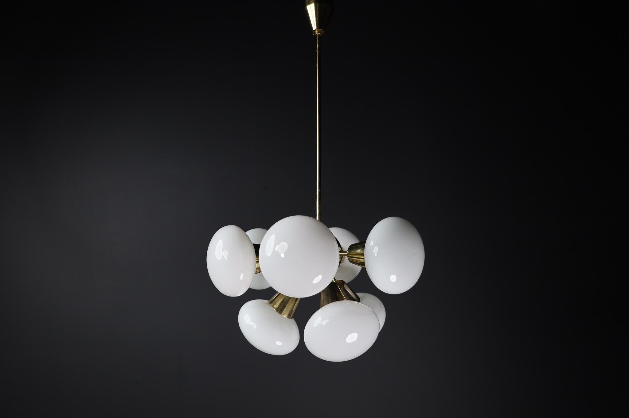 Mid-Century Modern Large set Sputnik Chandeliers in Brass and Opaline Glass Spheres, Europe 1970s For Sale