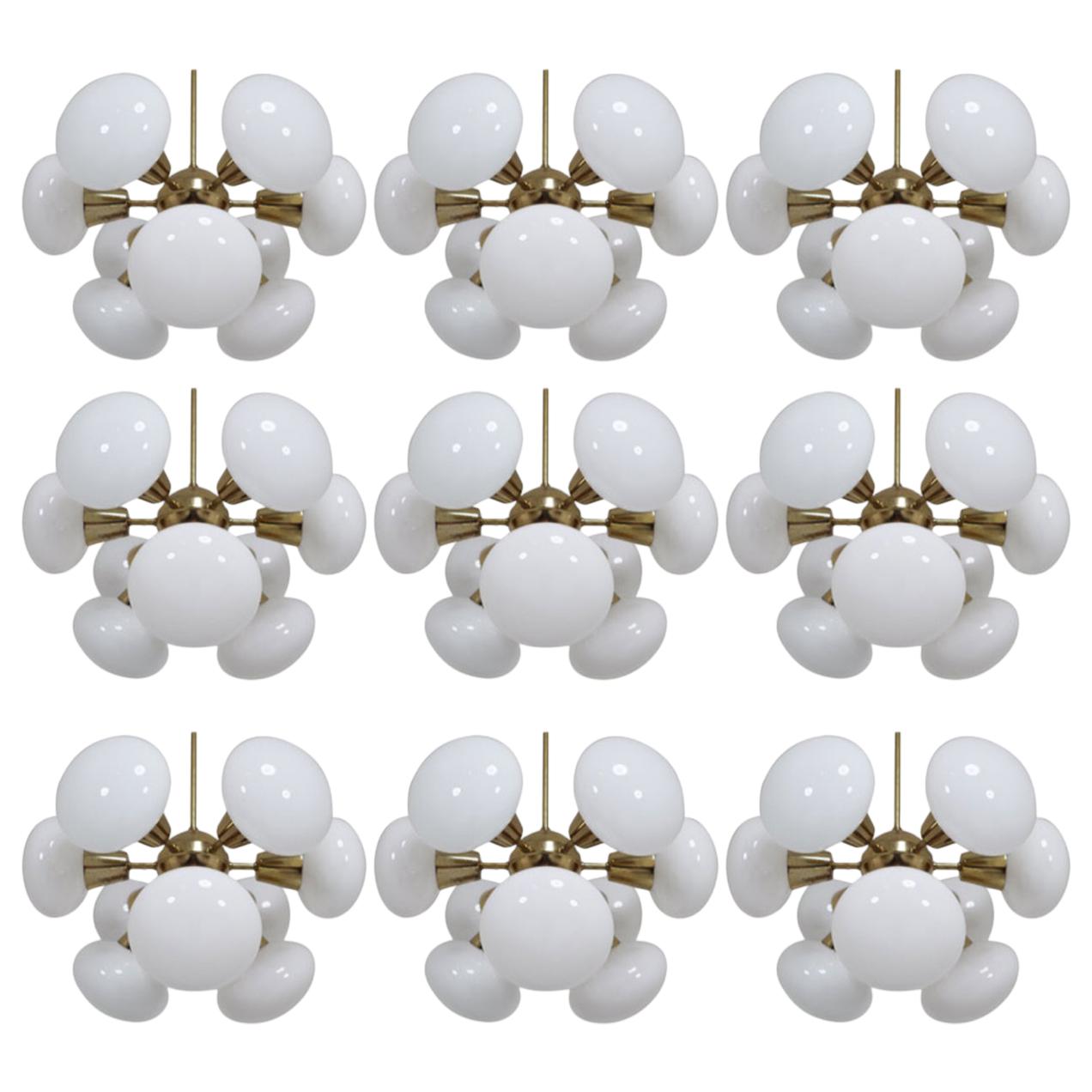 Large set Sputnik Chandeliers in Brass and Opaline Glass Spheres, Europe 1970s