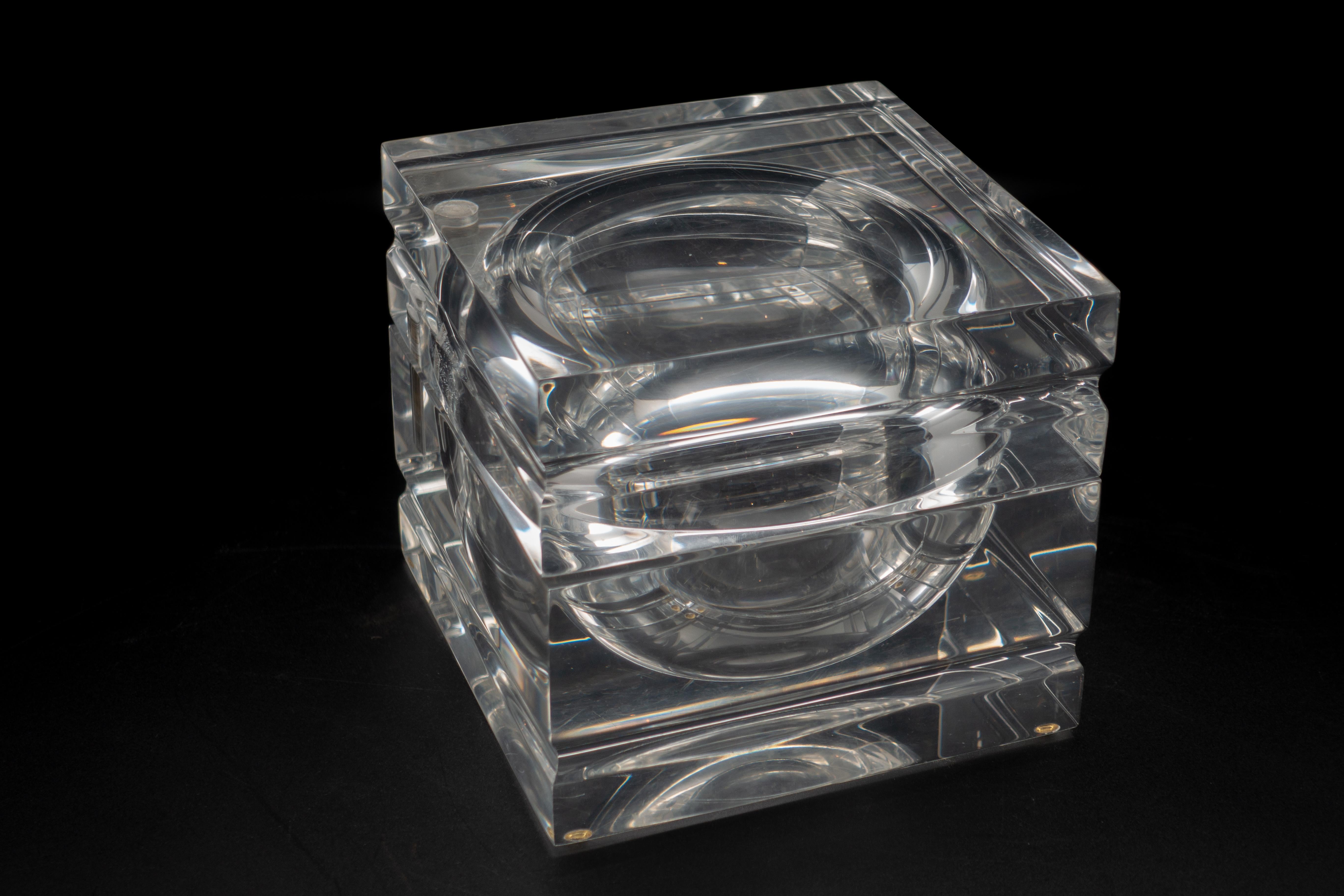 Very chic midcentury Lucite ice bucket with swivel top.
