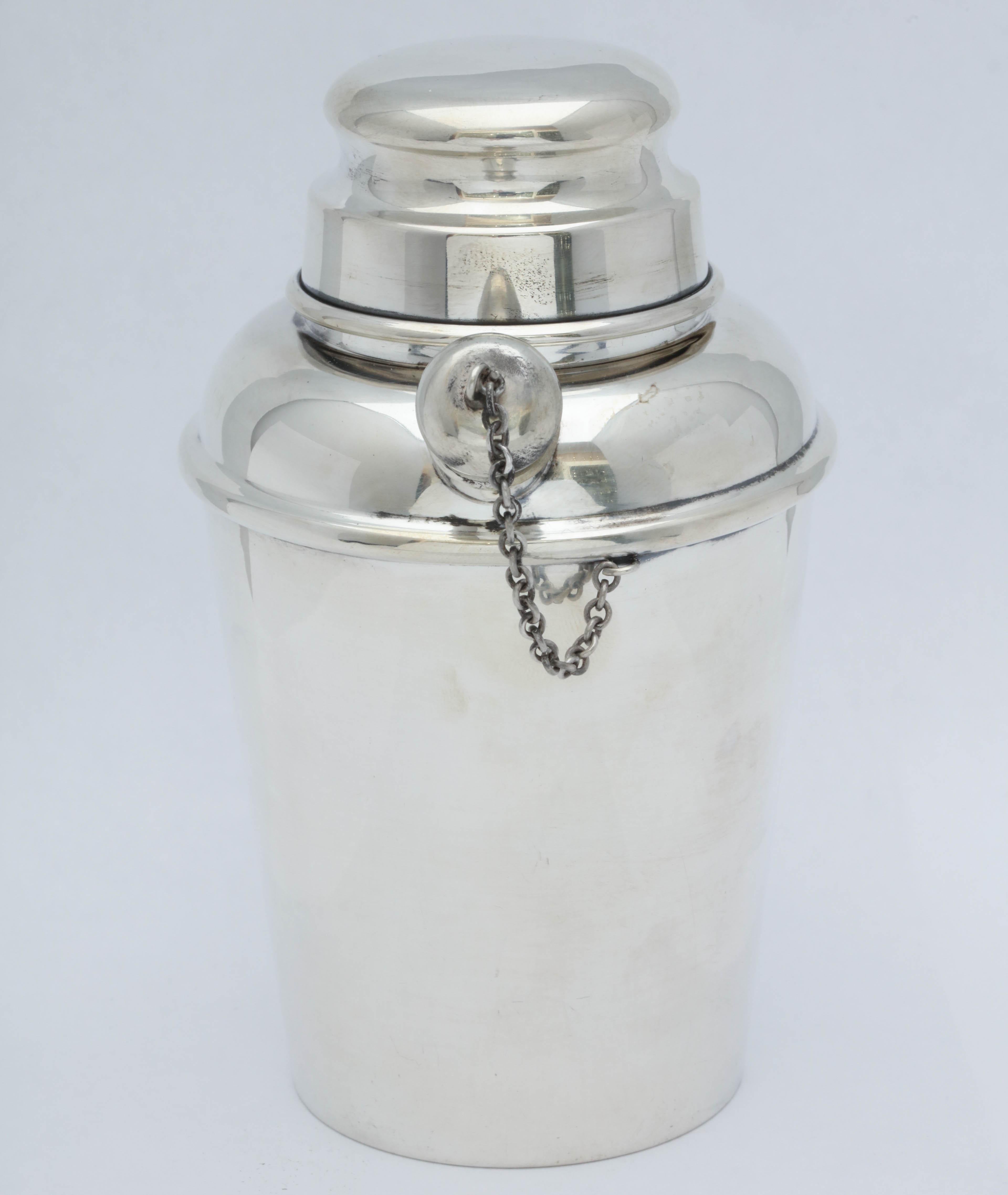 Midcentury, sterling silver cocktail Shaker - cocktails for two - Reed and Barton Silversmiths, Taunton, Mass, circa 1950. Measures: 5 1/2 inches high x 3 inches in diameter at widest point x 3 3/4 inches from end of spout to edge of Shaker. Weighs