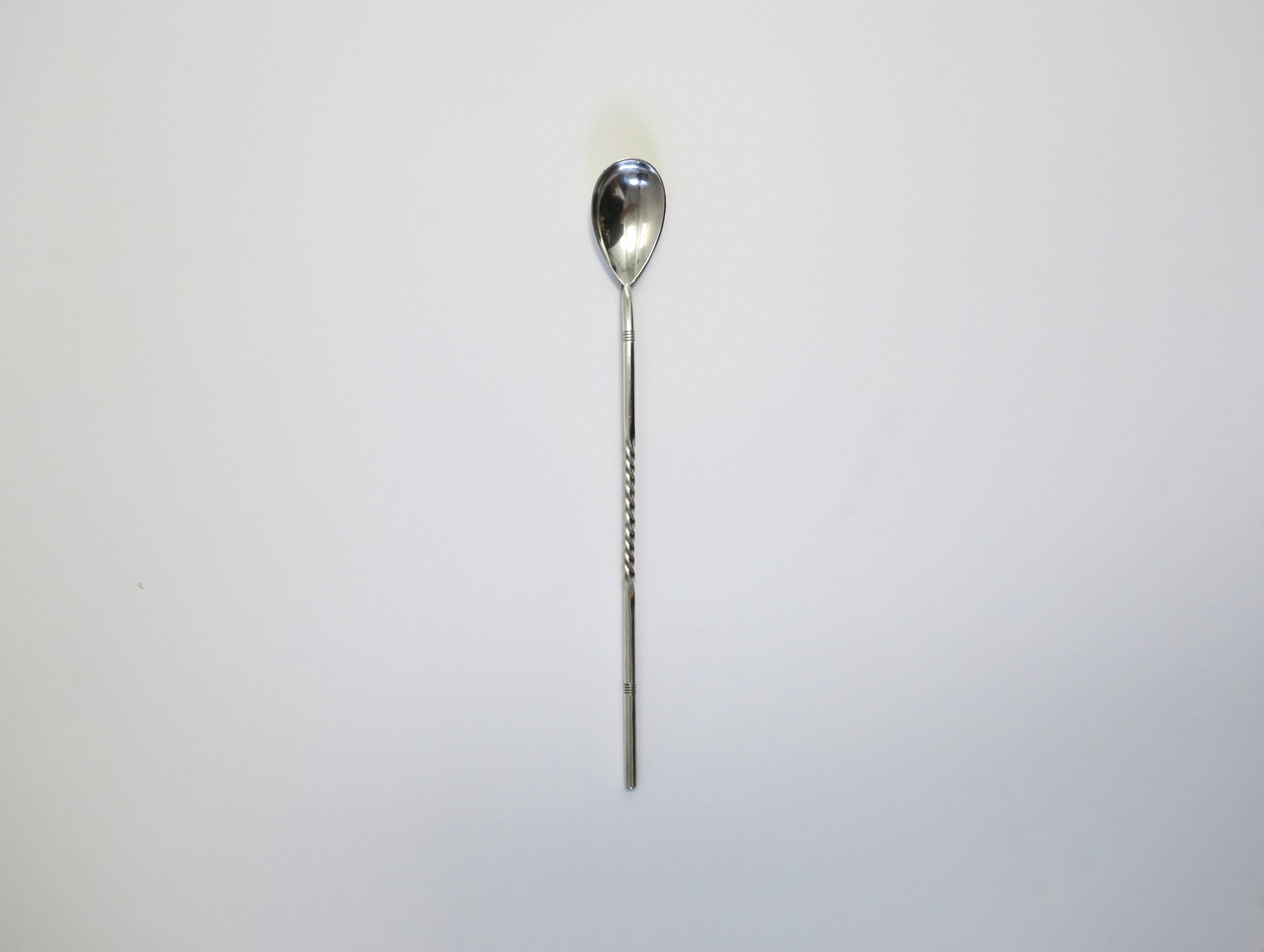 A solid sterling silver cocktail stirrer and spoon with twist detail, Midcentury Modern period, by Gorham Co., circa mid-20th century, USA. A great vintage sterling silver barware piece for any bar, bartender, mixologist, etc. Makers' mark on
