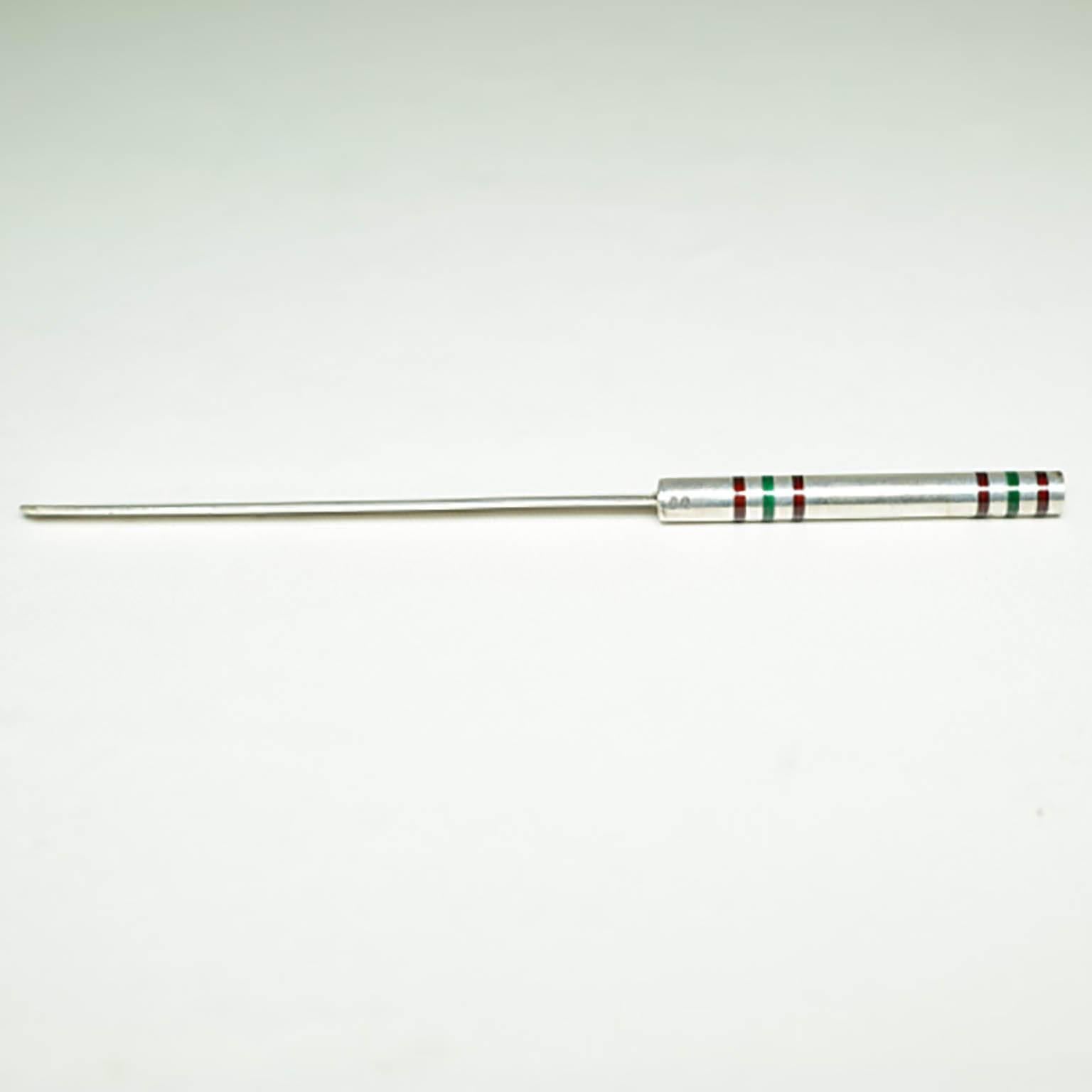 Sterling silver letter opener from Tiffany with bands of green and red enamel.