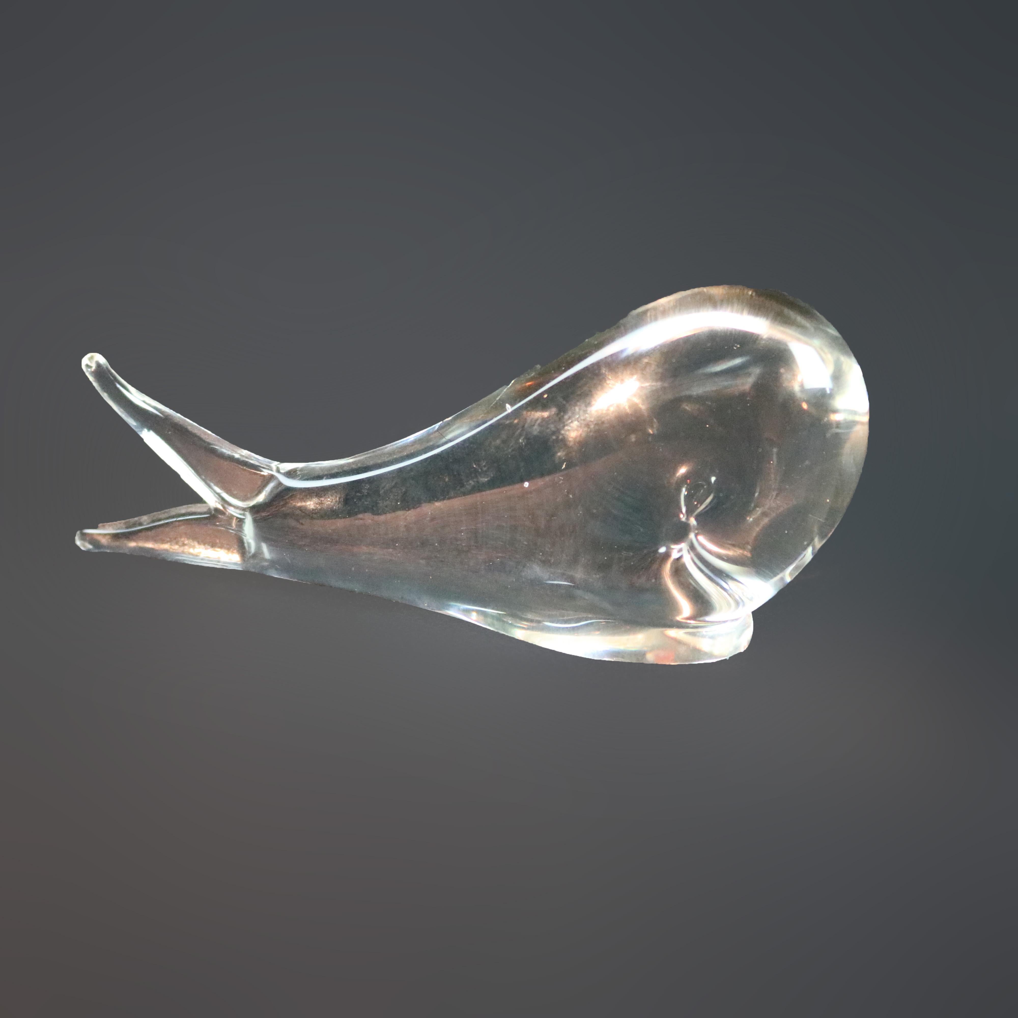 Midcentury Steuben figurative mouth blown crystal sculptural paperweight features colorless art glass in form of whale designed for Corning Museum of Glass, New York, NY, unsigned, 20th century.

Measures: 2.75