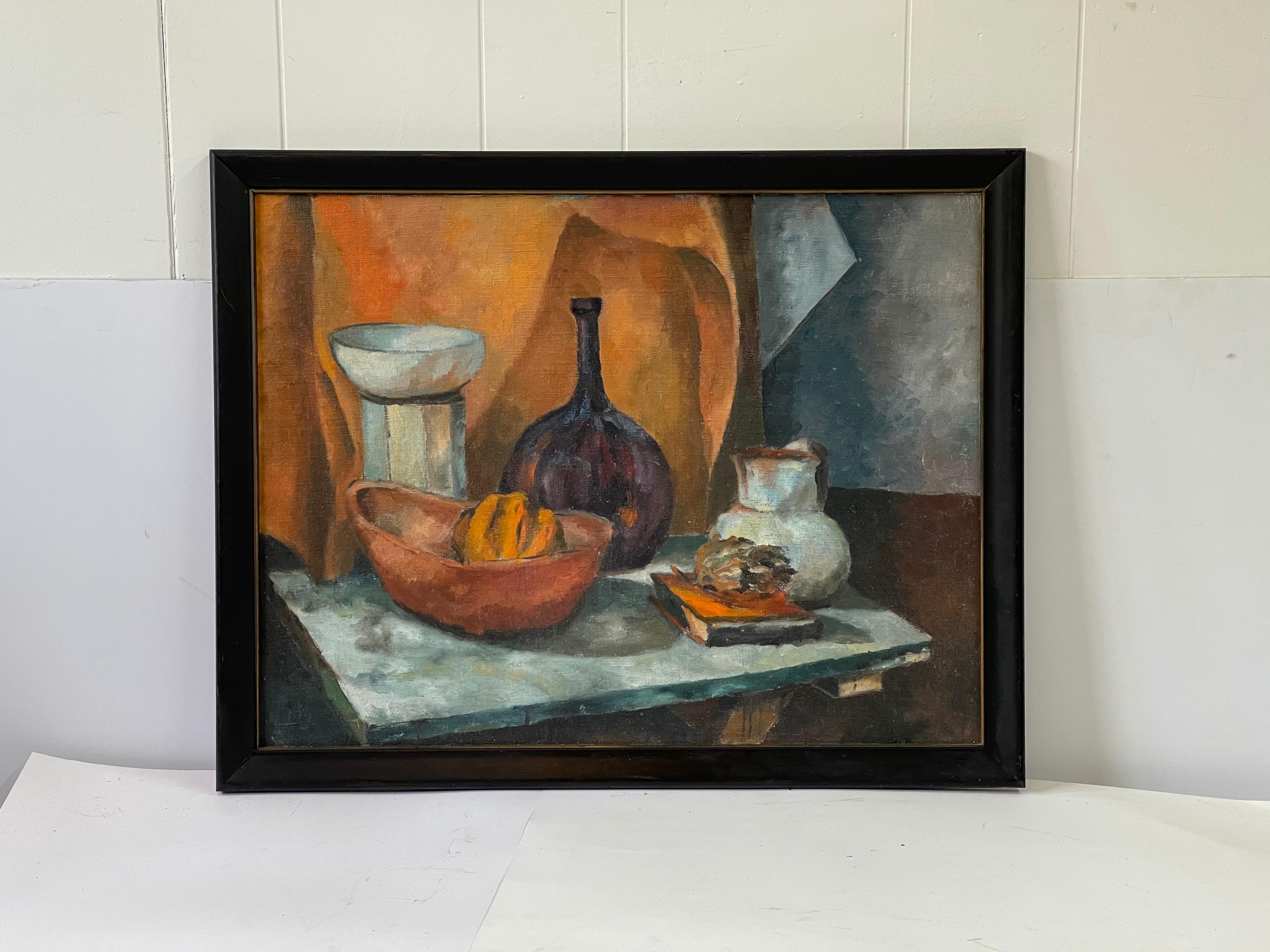 Midcentury still life oil on board painting of a tabletop. Among the vases, there is a bowl holding a squash and an artichoke stacked on top of books. Hues of purple and white pop against an orange backdrop of textiles. Unsigned.