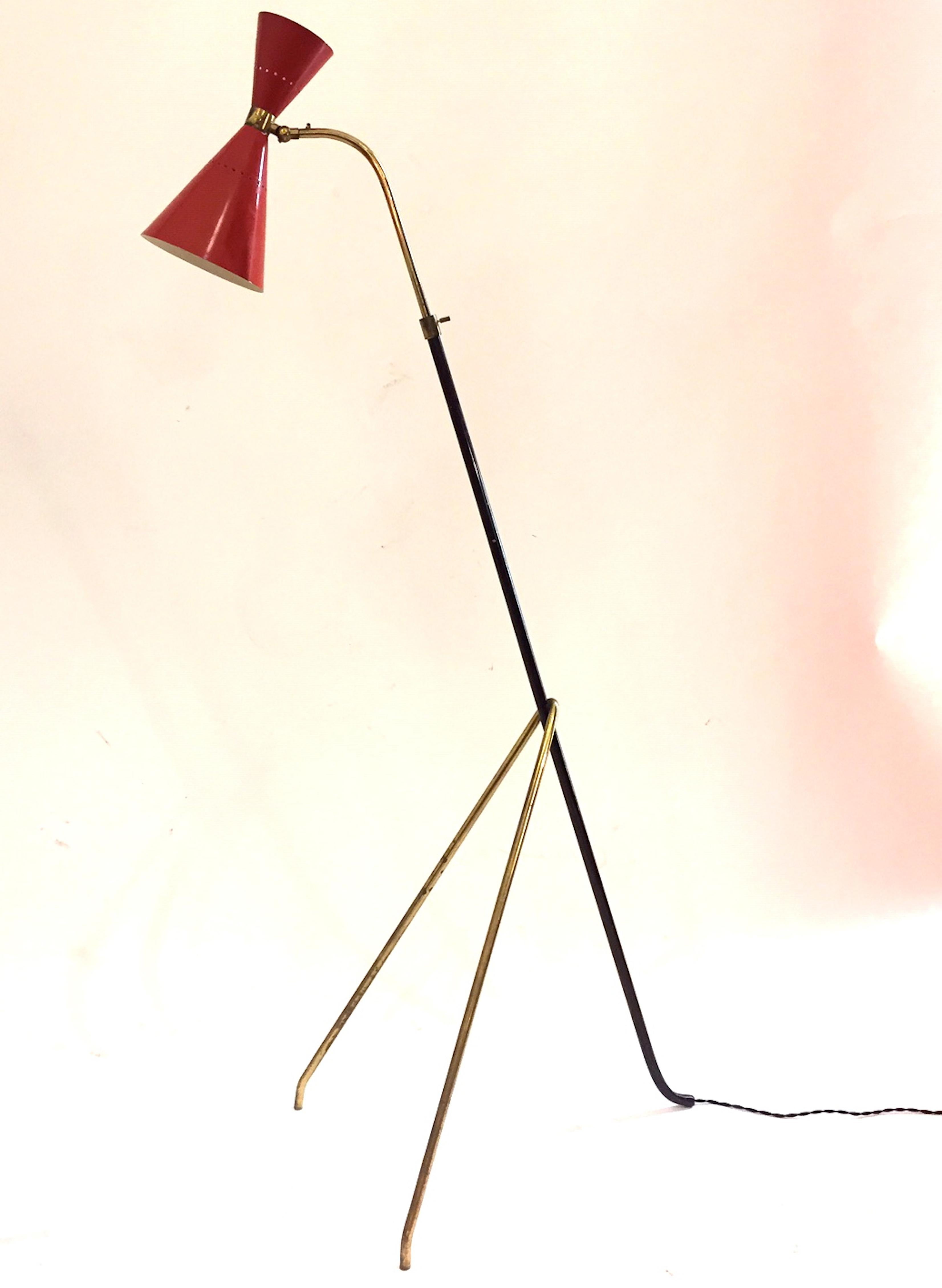 An exceptional Stilnovo floor lamp. Adjustable and extensible. Brass and red lacquered shade. Measures: Height 133/219 cm., shade 29 cm. Very good condition.