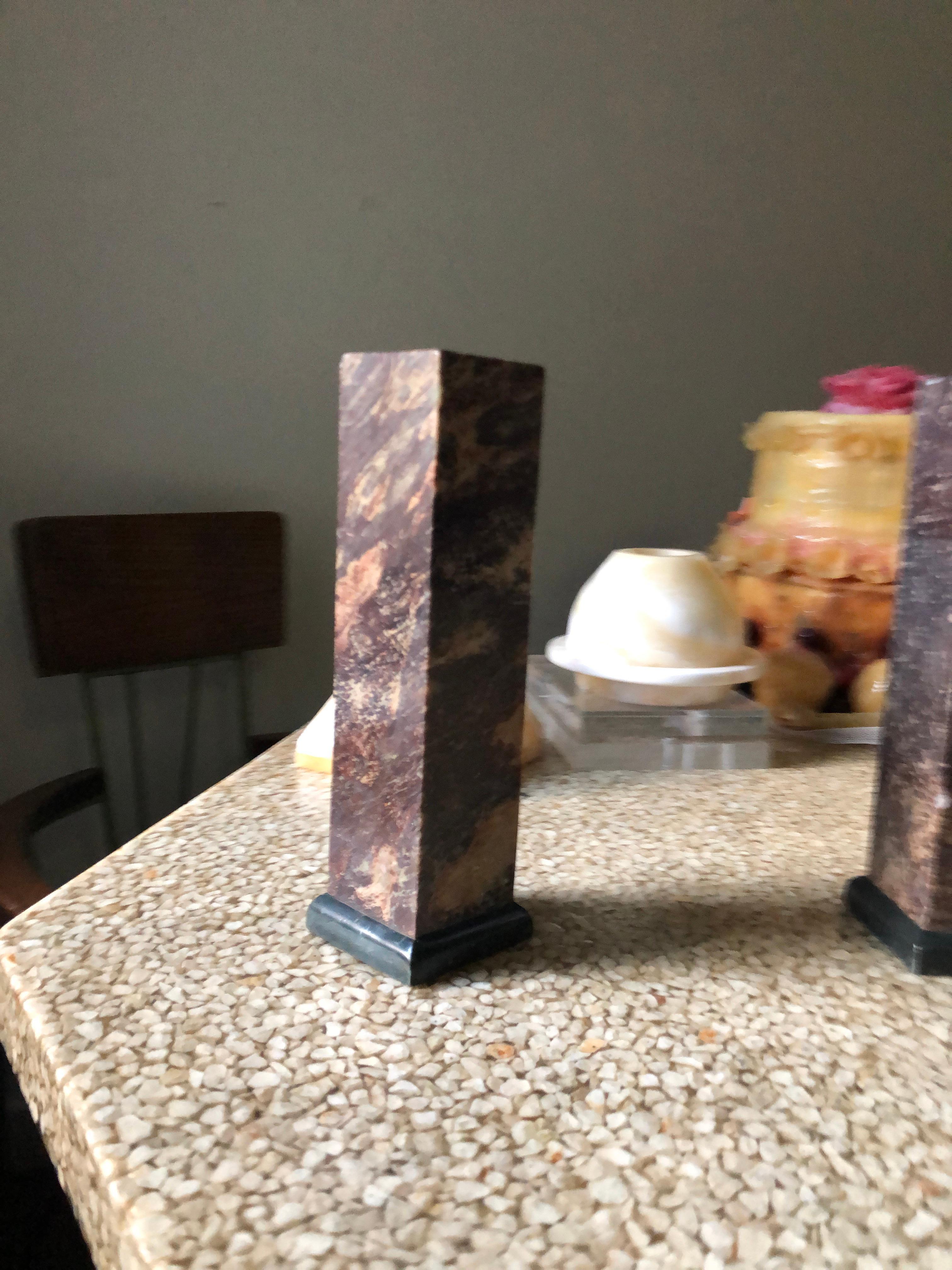 Midcentury stone pillar candleholder pair, chestnut granite, neoclassical 1960s set of two. Rich color, substantial weight.