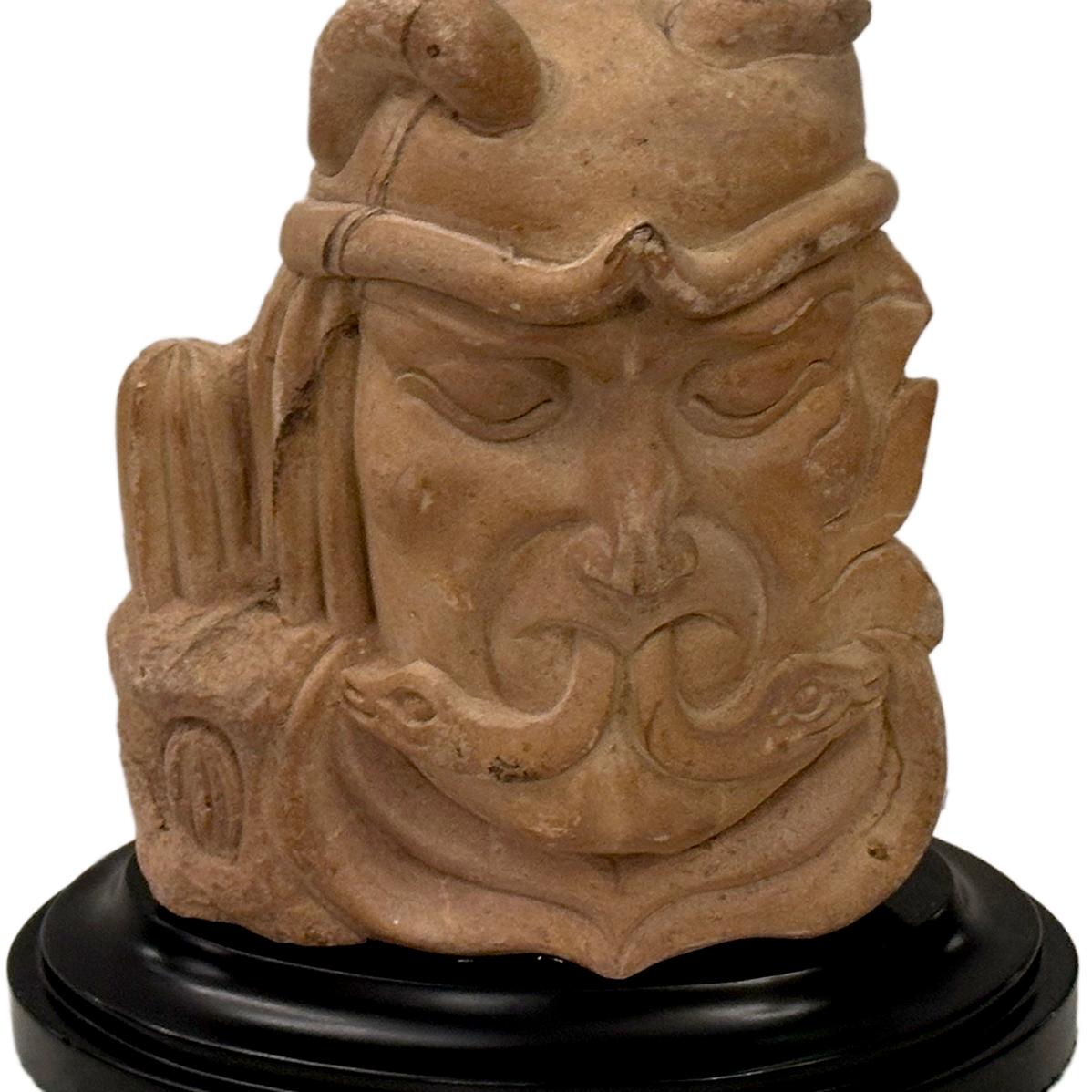 A circa 1950's Mexican stone sculpture on a wood base.

Measurements:
Height: 10