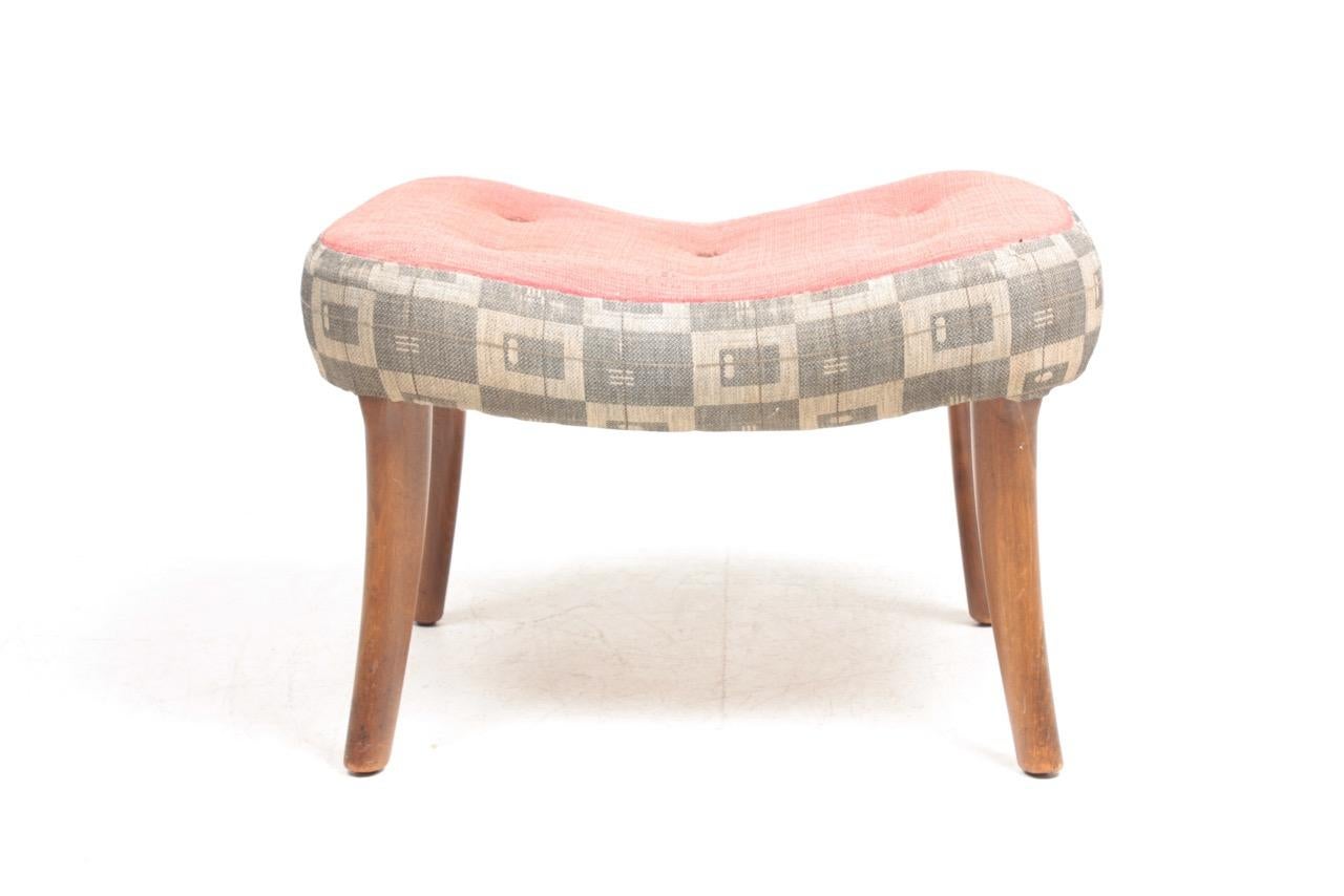 Ottoman in fabric, designed by Danish architects Ib Madsen & Acton Schubell.