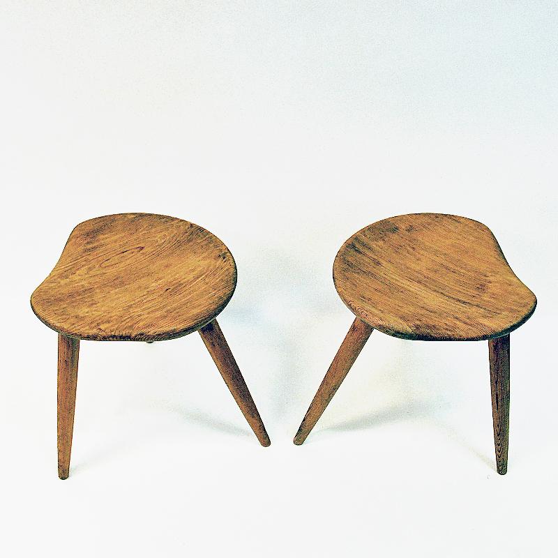 Two lovely and solid wood stools made by Norsk Husflid, Norway. One stool is marked Norsk Husflid Vällingby Oktober 1960. The other stool is marked Norsk Huseflid Stockholm Utställning 1940. Nice pair of Norwegian Handcraft. Perfect as an extra