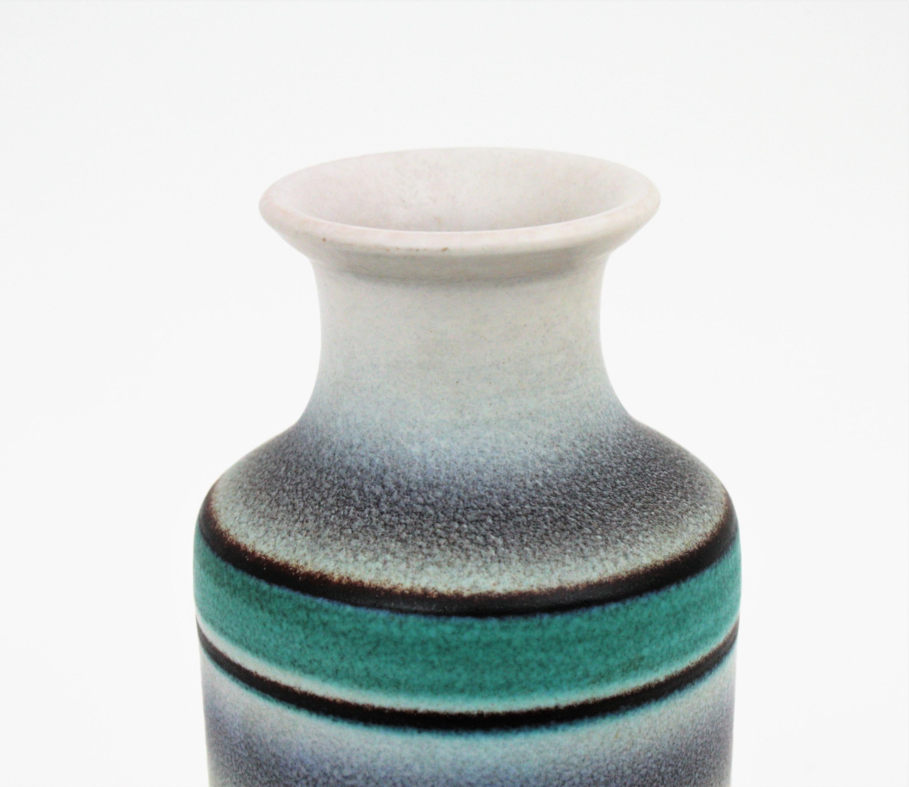 blue and white striped ceramic vase