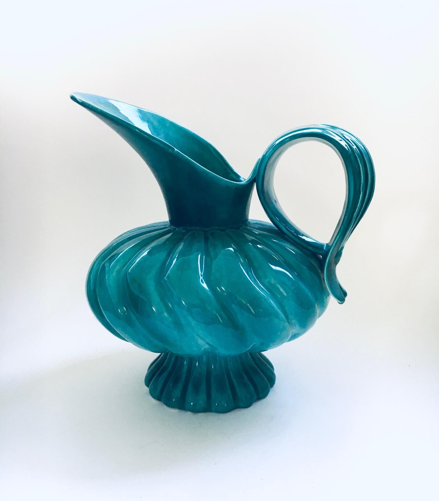 Vintage Midcentury Studio Art Pottery XL Duck Spout Decanter Carafe Jug Pitcher by Alexandre de Wemmel. Made in Belgium, 1950's period. Signed at the bottom. XL green glazed bulbous maximal design decanter carafe. This comes in very good condition.