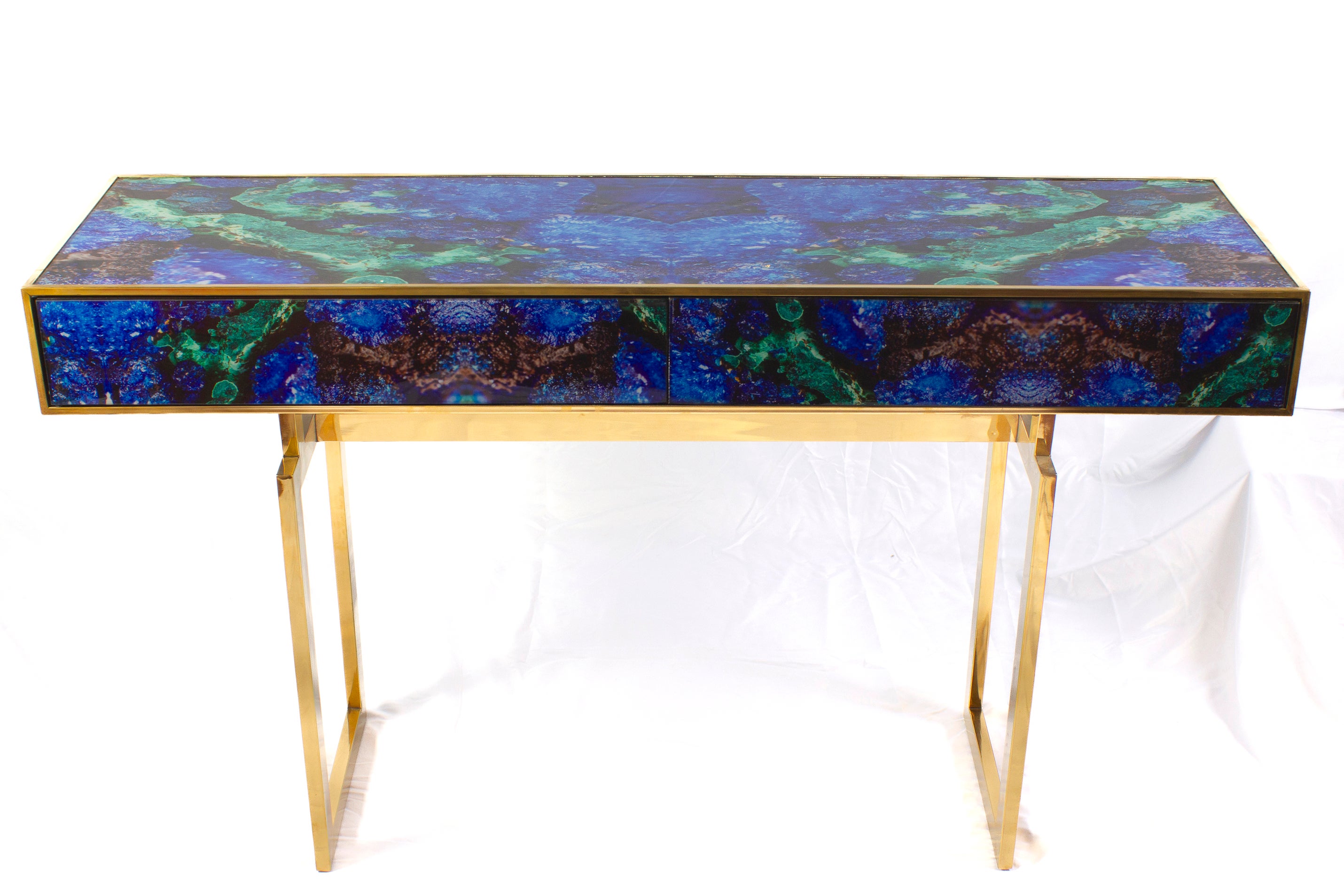 Striking brass frame and hand-cut Lapis lazuli imitation Murano glass Console  table with two drawers, raised on special brass legs. 
Handmade by a master artisan.
Price is for one item. 
 Available also  a pair .