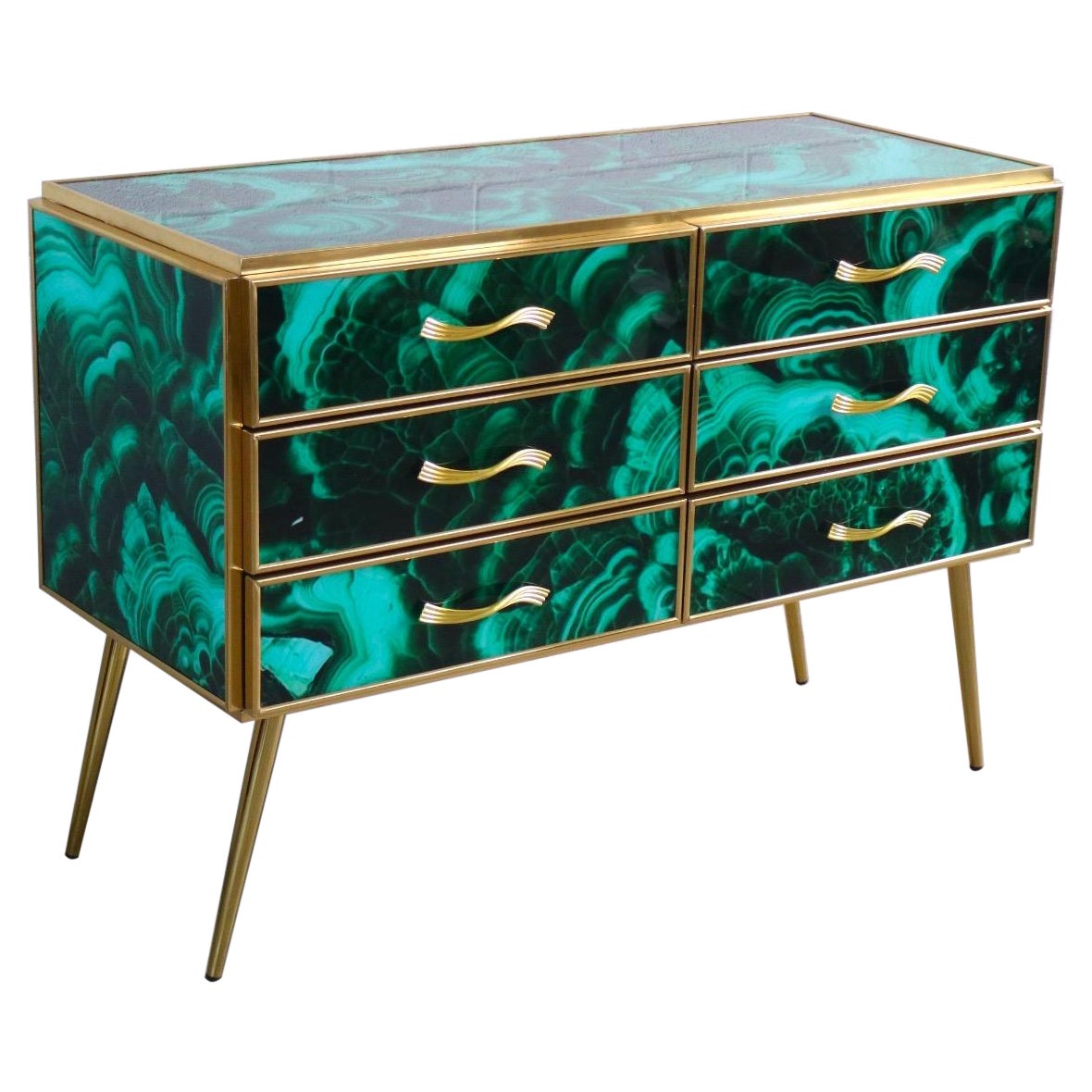 Striking brass frame and hand-cut Malachite imitation Murano glass Commode or chest of drawer, raised on special brass legs. 
Handmade by a master artisan.