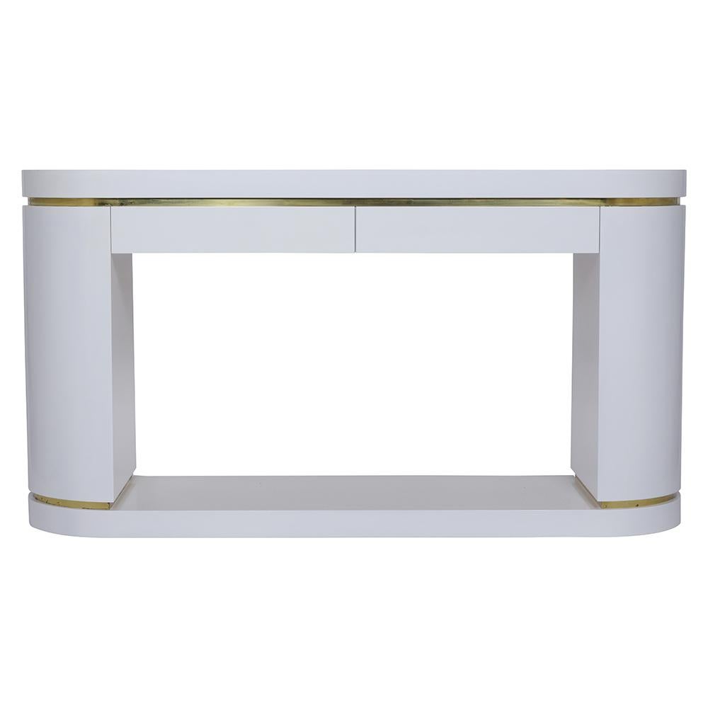 Presenting a remarkable vintage mid-century console table, beautifully crafted out of maple wood with a fresh white lacquered finish. This table has been professionally restored by our team of in-house craftsmen. The table's unique design includes