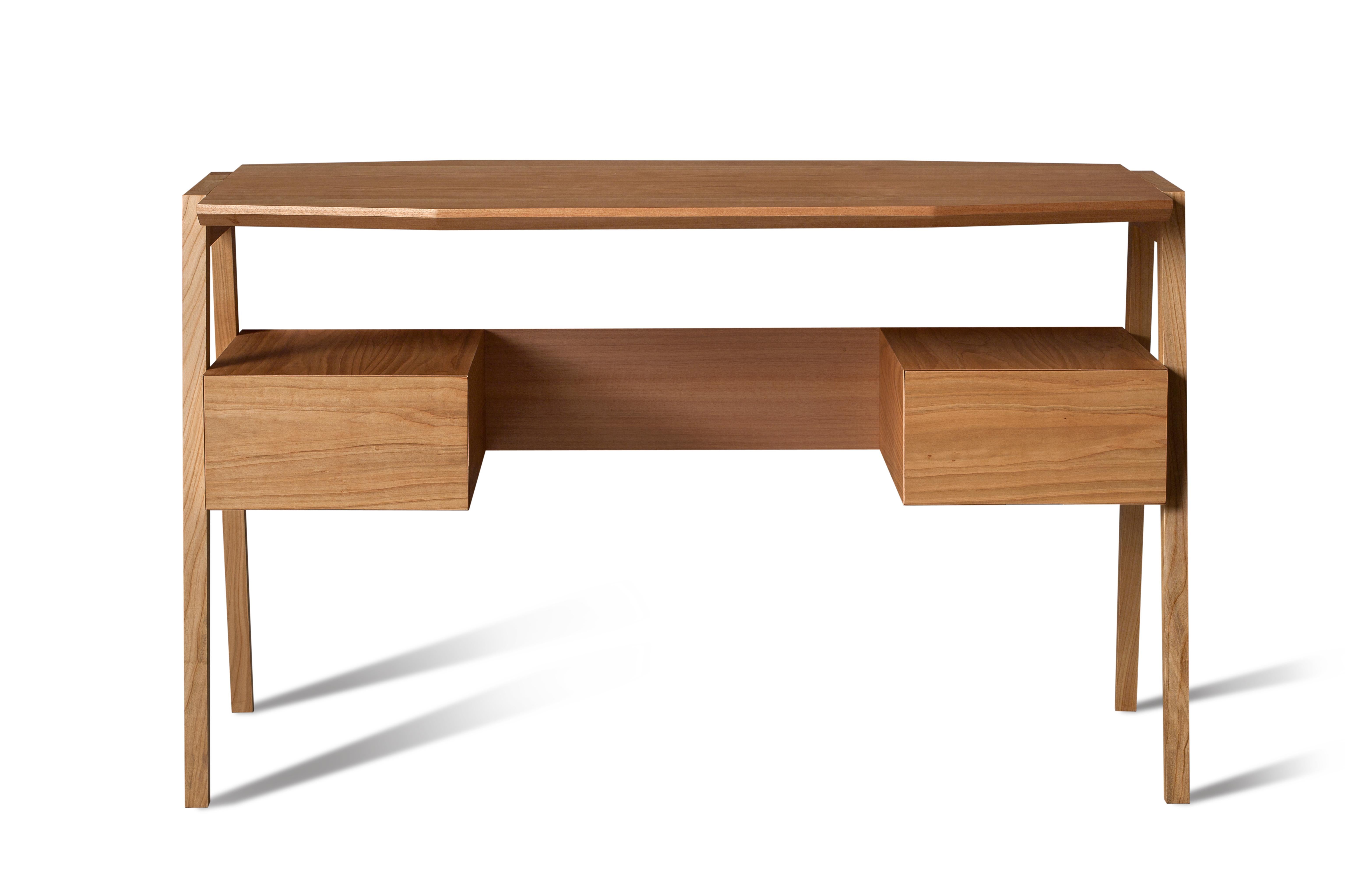 Eugenio is a midcentury style writing desk made of cherrywood or ash wood with two drawers, characterized by a octagonal top.
Available in different wood colors.
Made in Italy by Morelato