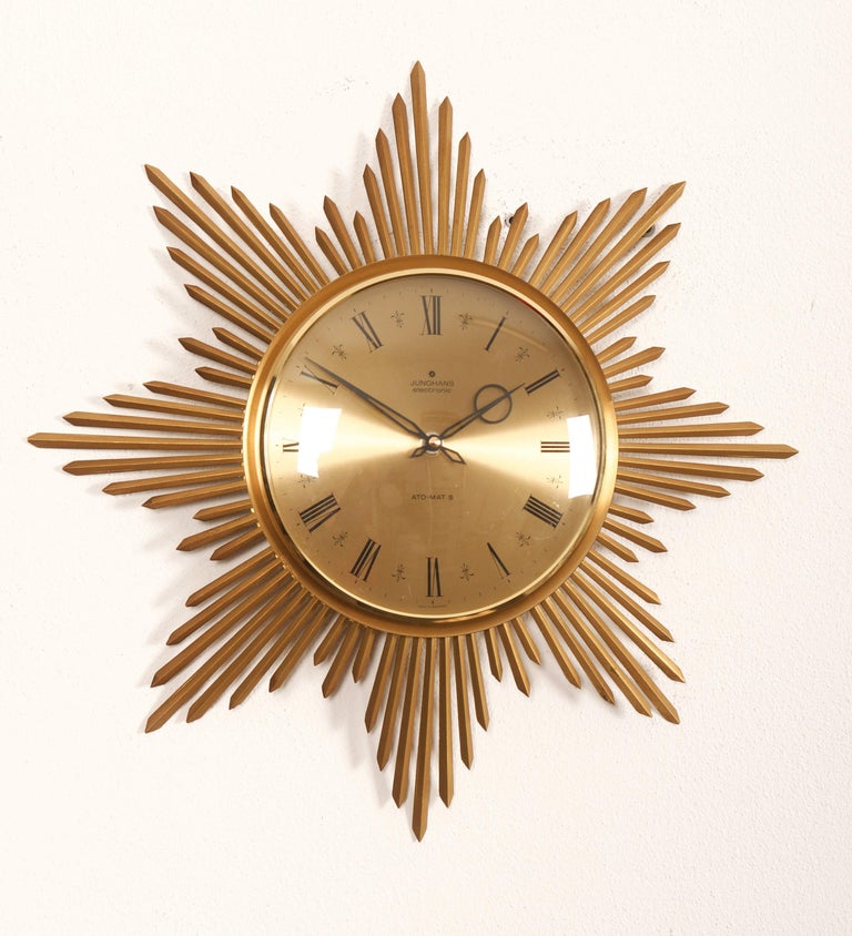 Midcentury Sunburst Junghans AtoMat Wall Clock at 1stDibs