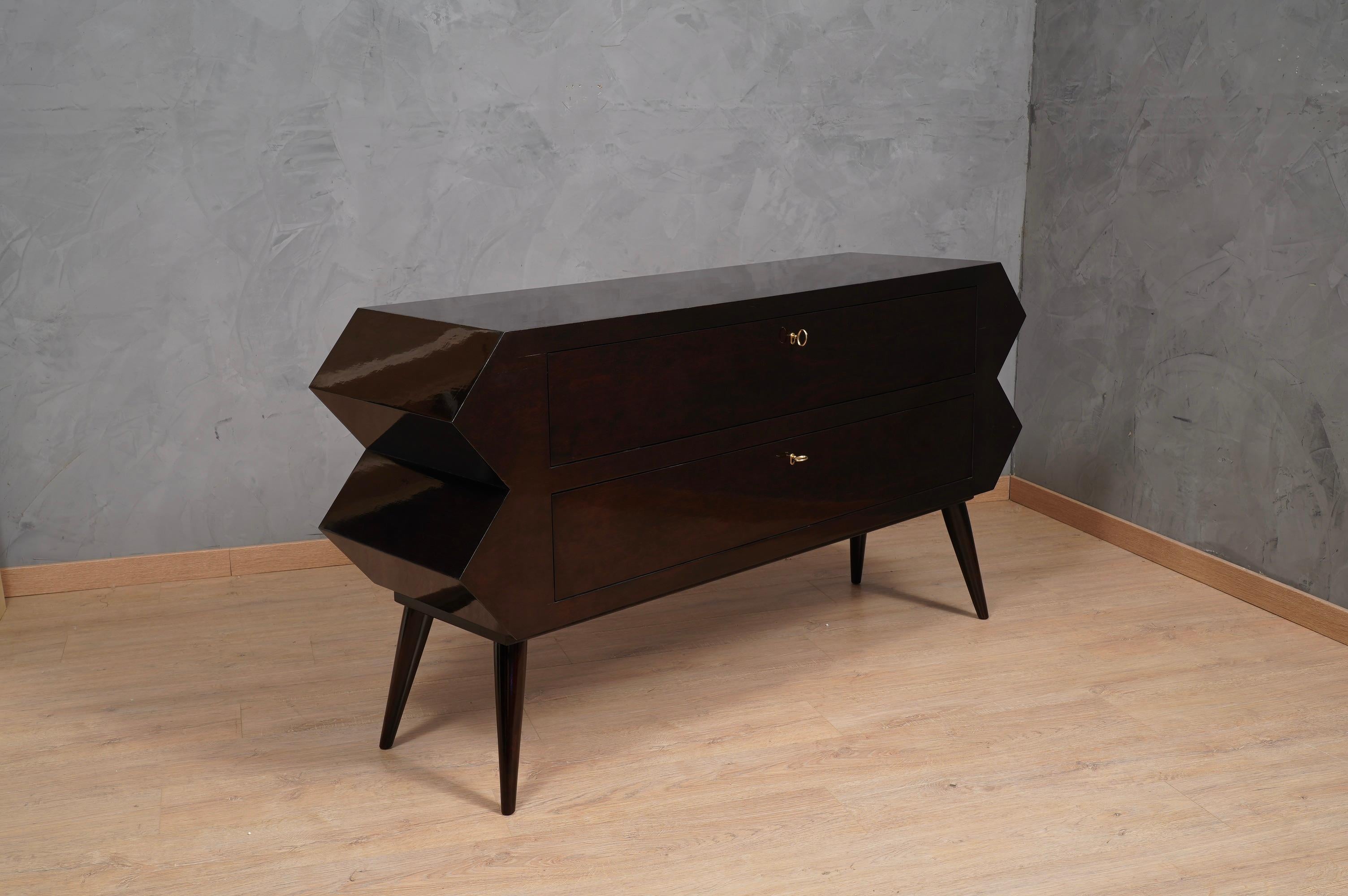 Unmistakable design, and super polishing with dyed dark mahogany shellac. It absolutely cannot be missing in your home.

A beautiful dresser with a surprising design, the commode is all dyed dark mahogany polished like a piano; its design is very